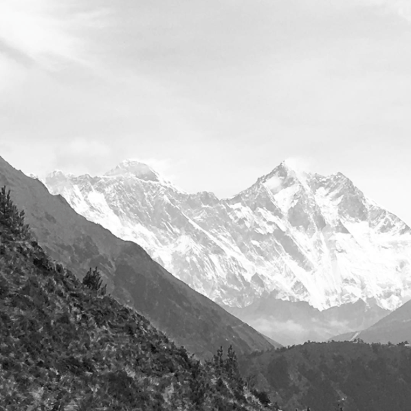 Everest is the one poking through on the left, Lhotse is the tall one on the right (4th highest peak in the world).