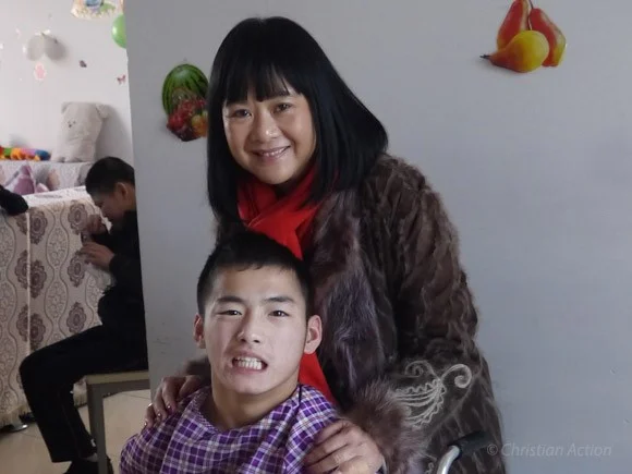 Christian Action Executive Director, Mrs. Siew Mei Cheung with Mark