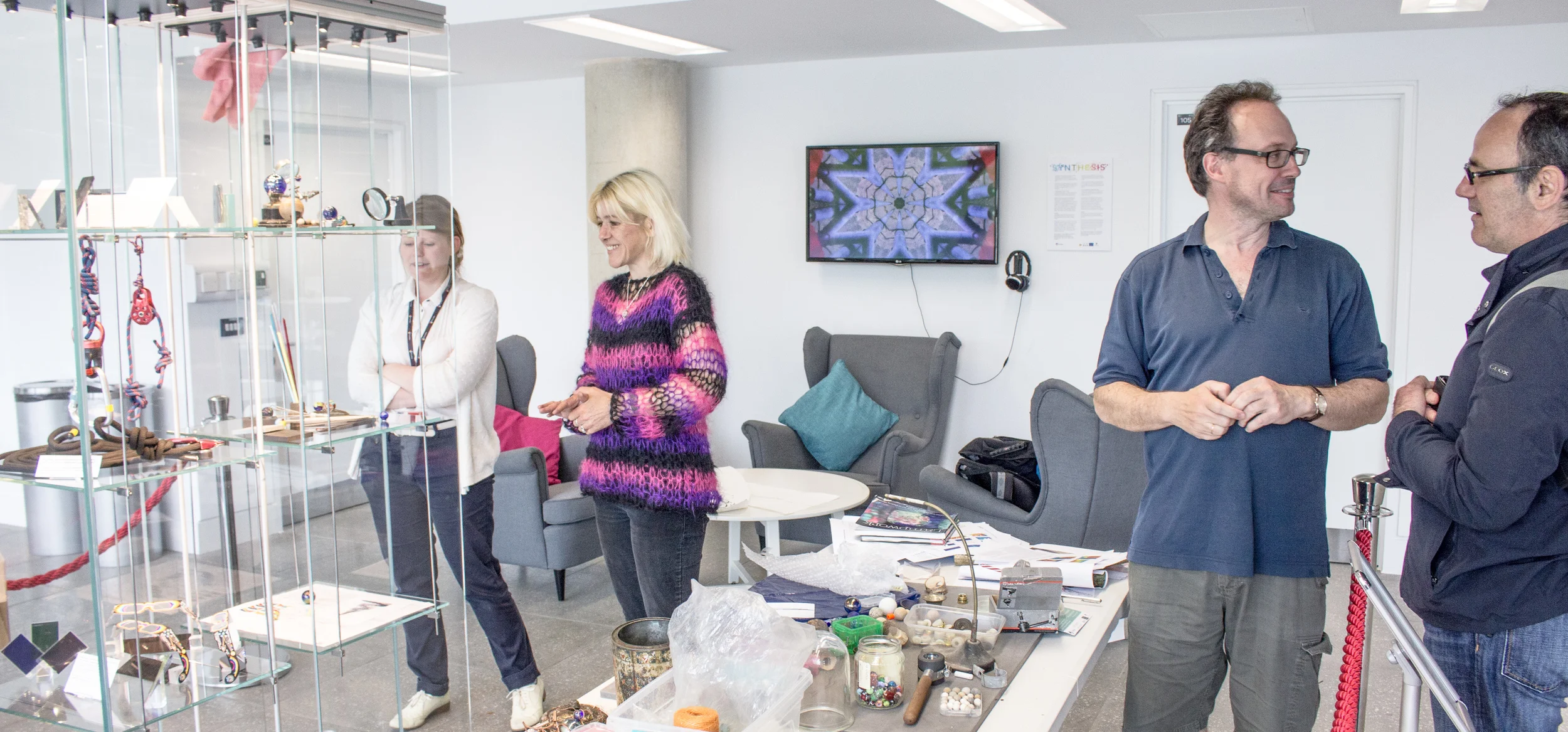 Creating the Llif/Flow 'display' at Pontio: Jonathan and Lisa in the centre taking a break from creating the display together (Lisa talking aesthetics, Jonathan talking Langmuir Circulation)