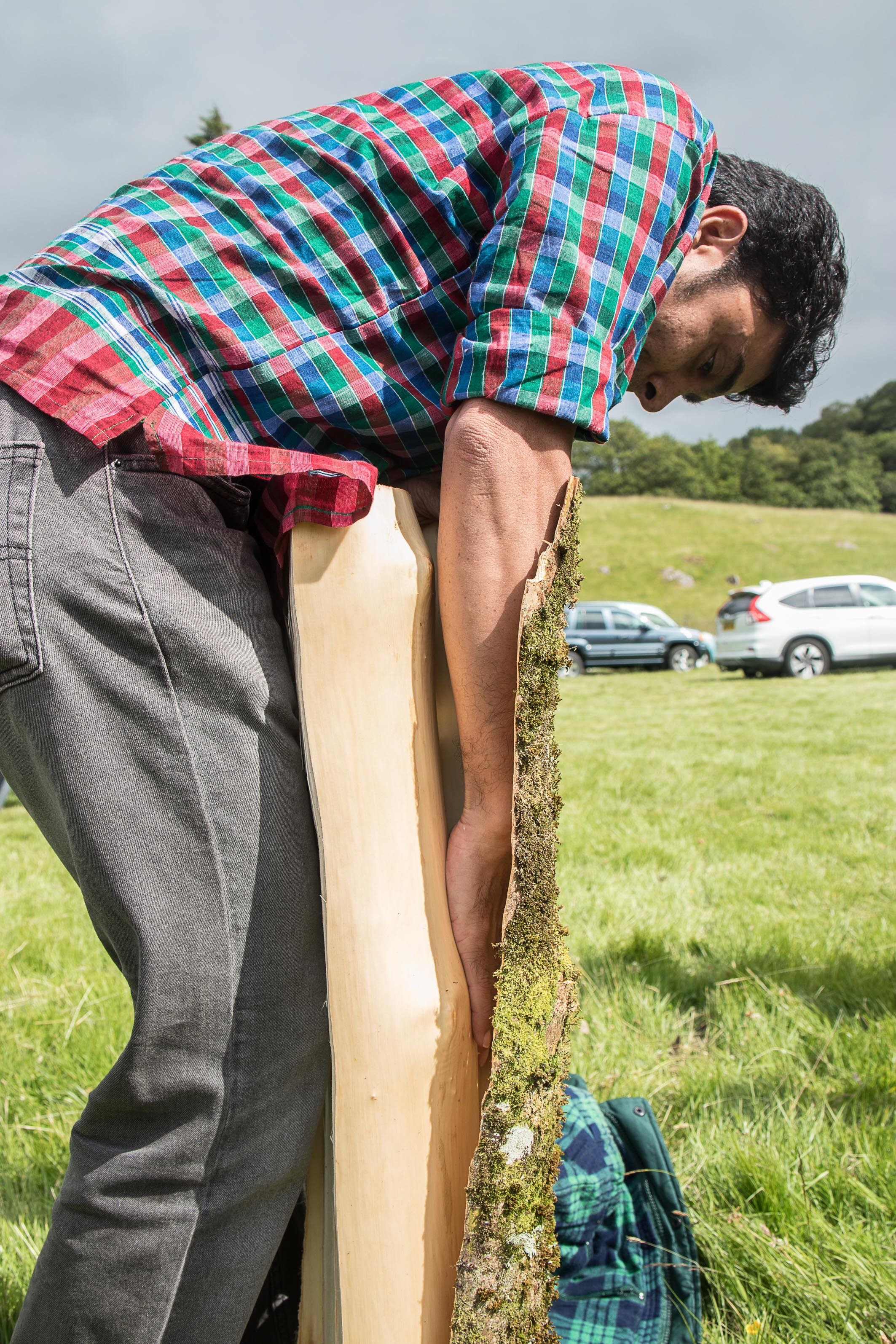 Vikram stripping bark at Capel Curig Carnifal (3 of 4).jpg