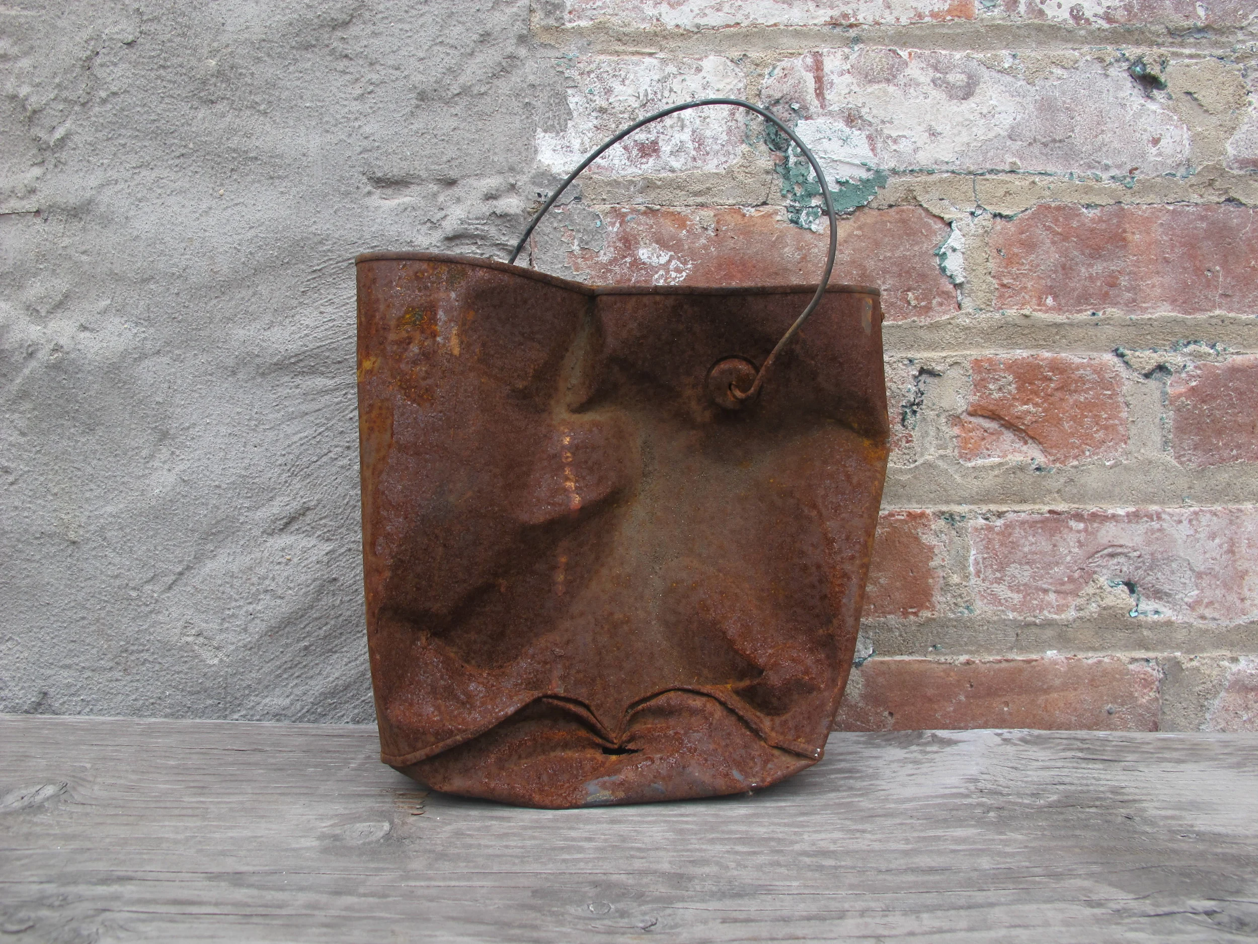 Small Rusted Crushed Bucket $5