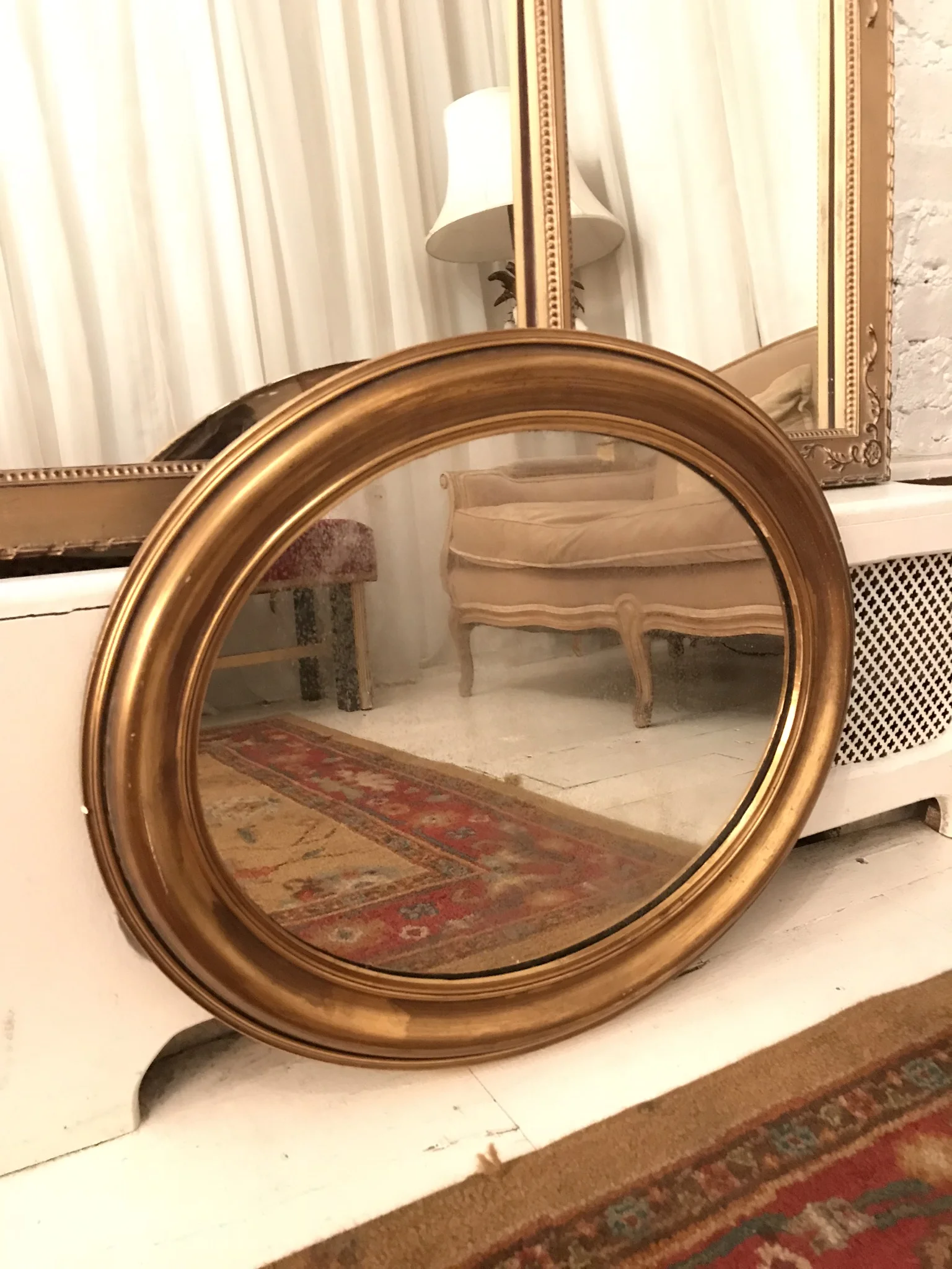 Gold framed oval mirror $70