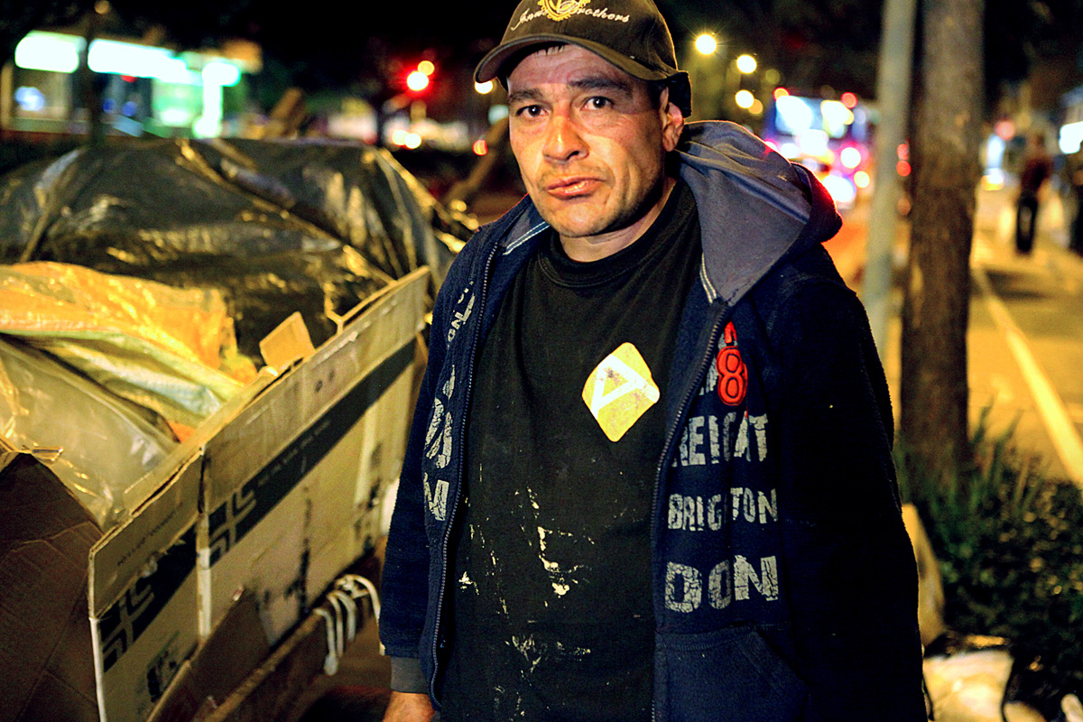 Alejandro Rodriguez Gaviria searches fro miles day and night everyday. Bogota 2014.