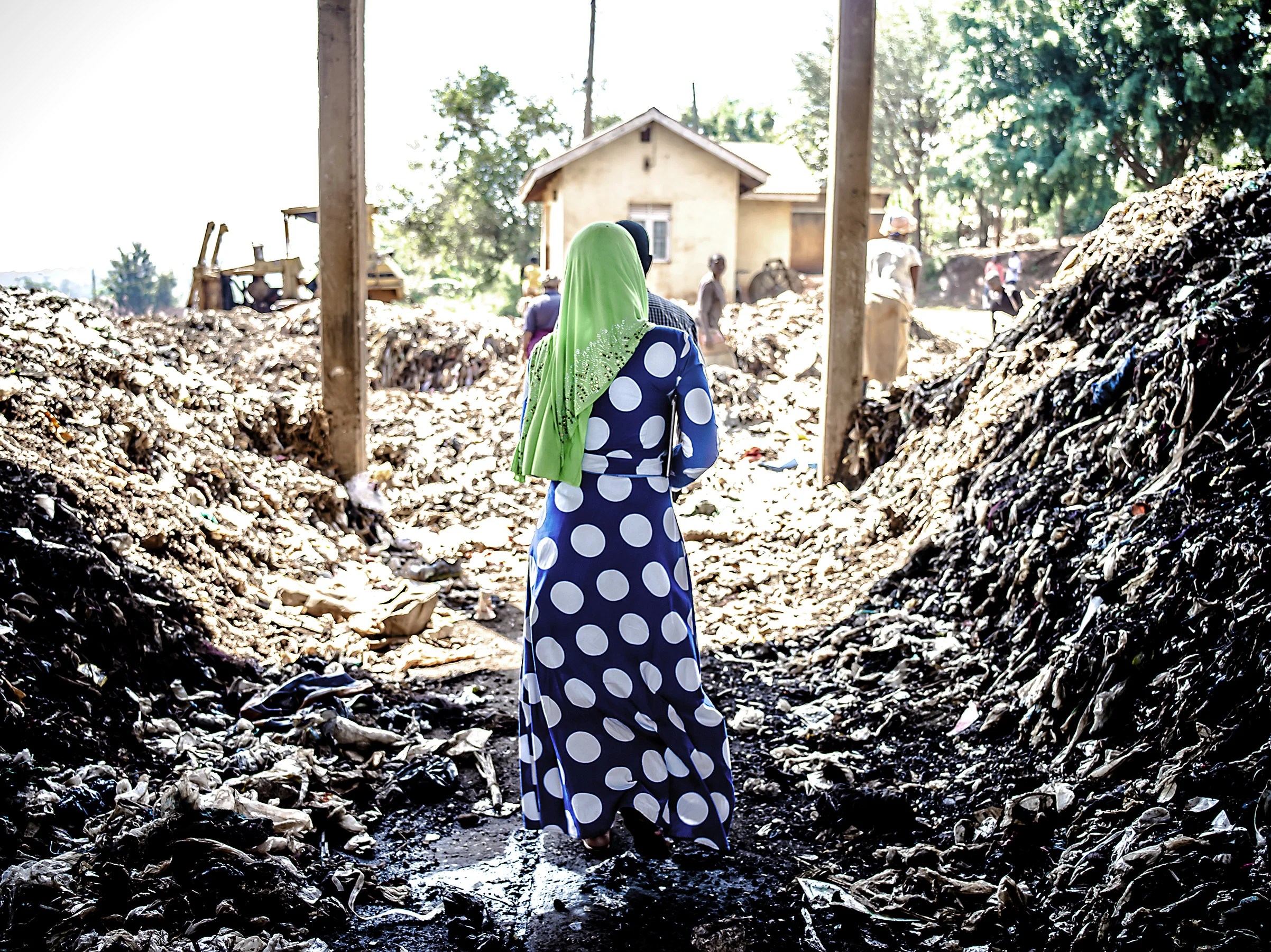 Woman who runs and contracts the Jinja dumpsite. 