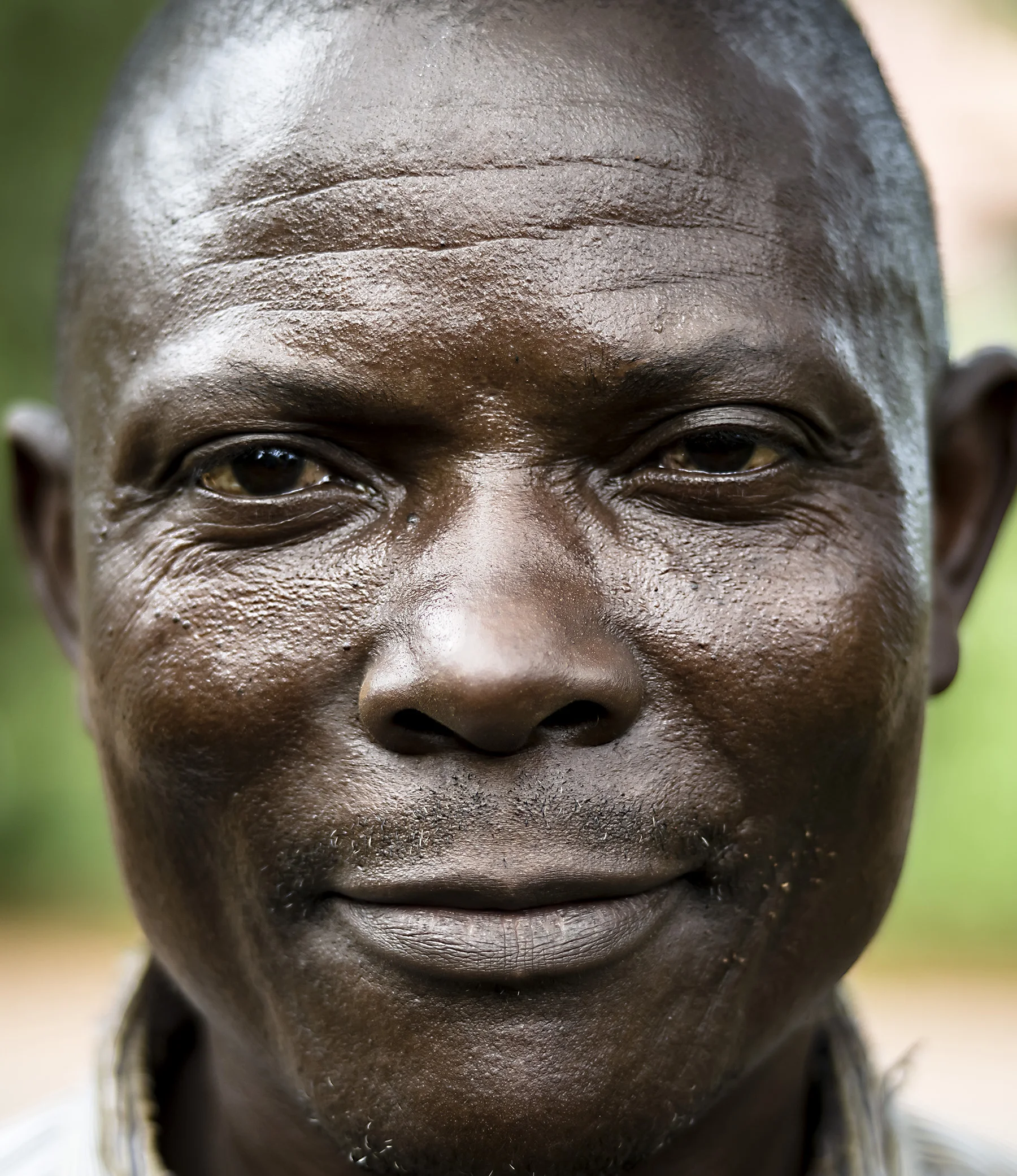 I end the photos with this face because this man is a farmer who receives the sifted and treated soil from the composting and dumpsites to grow gardens. He is one of the completions of circularity for waste besides recycling material; gardening and starting new life cycle. 