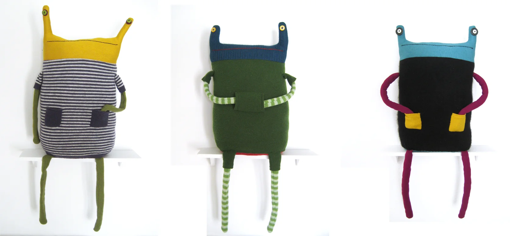 Left to right: Beast Pillow No. 206, Beast Pillow No. 207, and CMYK Beast Pillow No. 208.