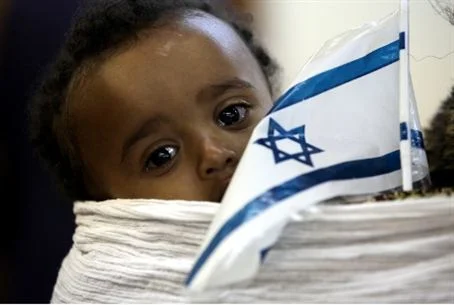 Ethiopian child with a Jewish/Israelite flag
