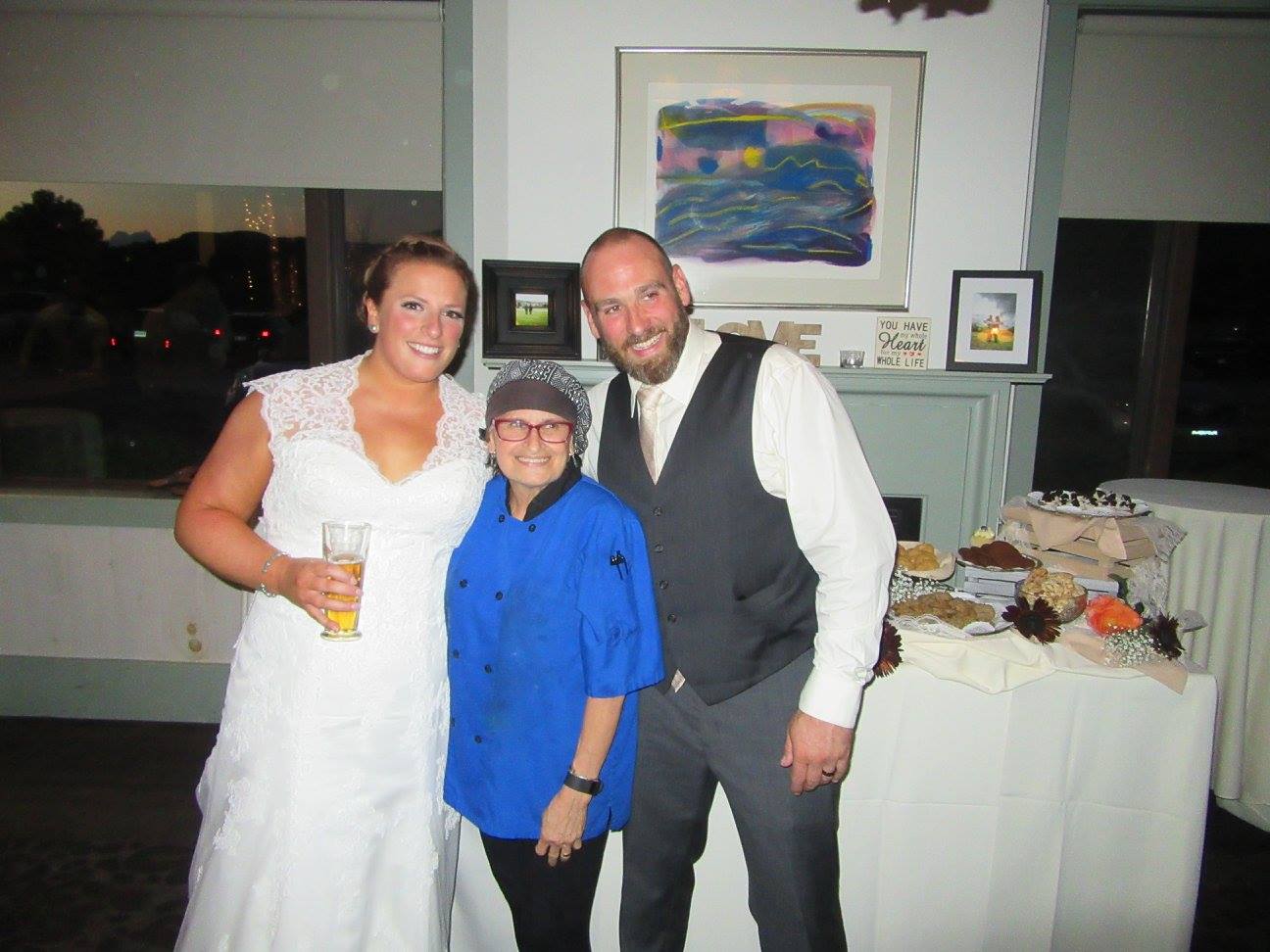 Chef Odille with the newlyweds and her famous Crissey Farm Petite Dessert Display. 