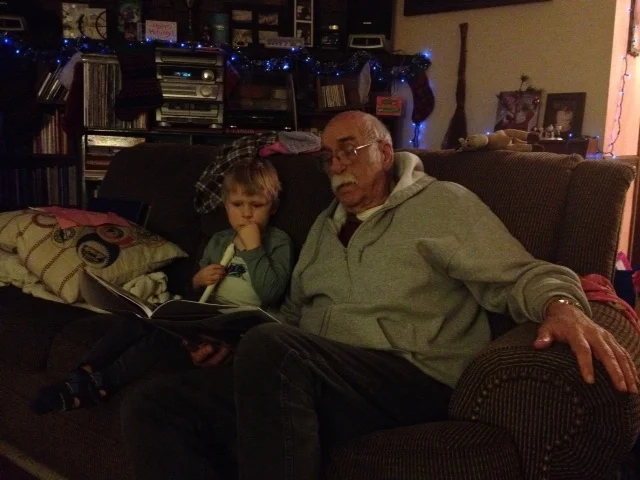 Brandon had no trouble volunteering his Grandpa to read to him.