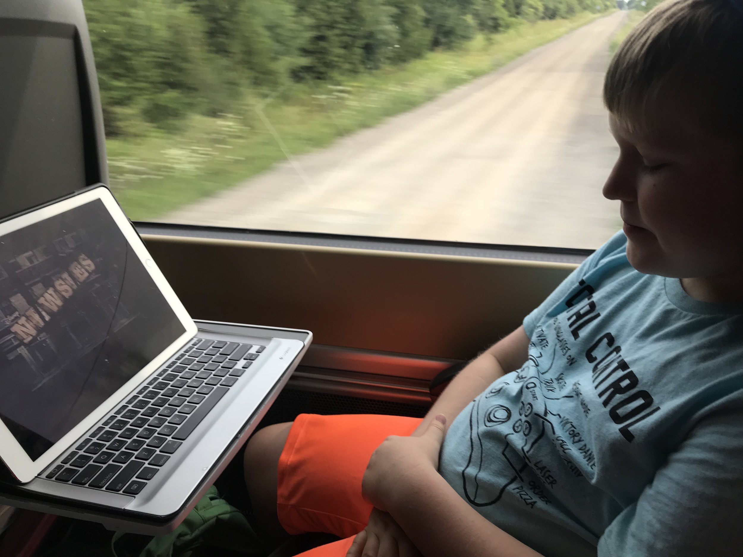 Watching Newsies on the train to Toronto