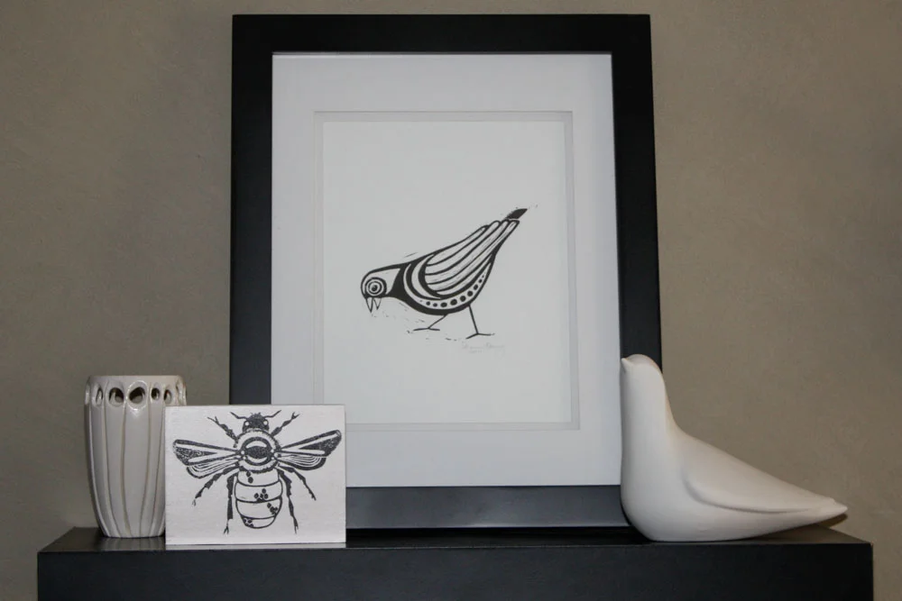 Bee Block Print: Sunny Mullarkey Studio, Bird Print: Sharon Lorenz, Ceramic Bird; West Elm, Carved Pottery Vase: Unknown 