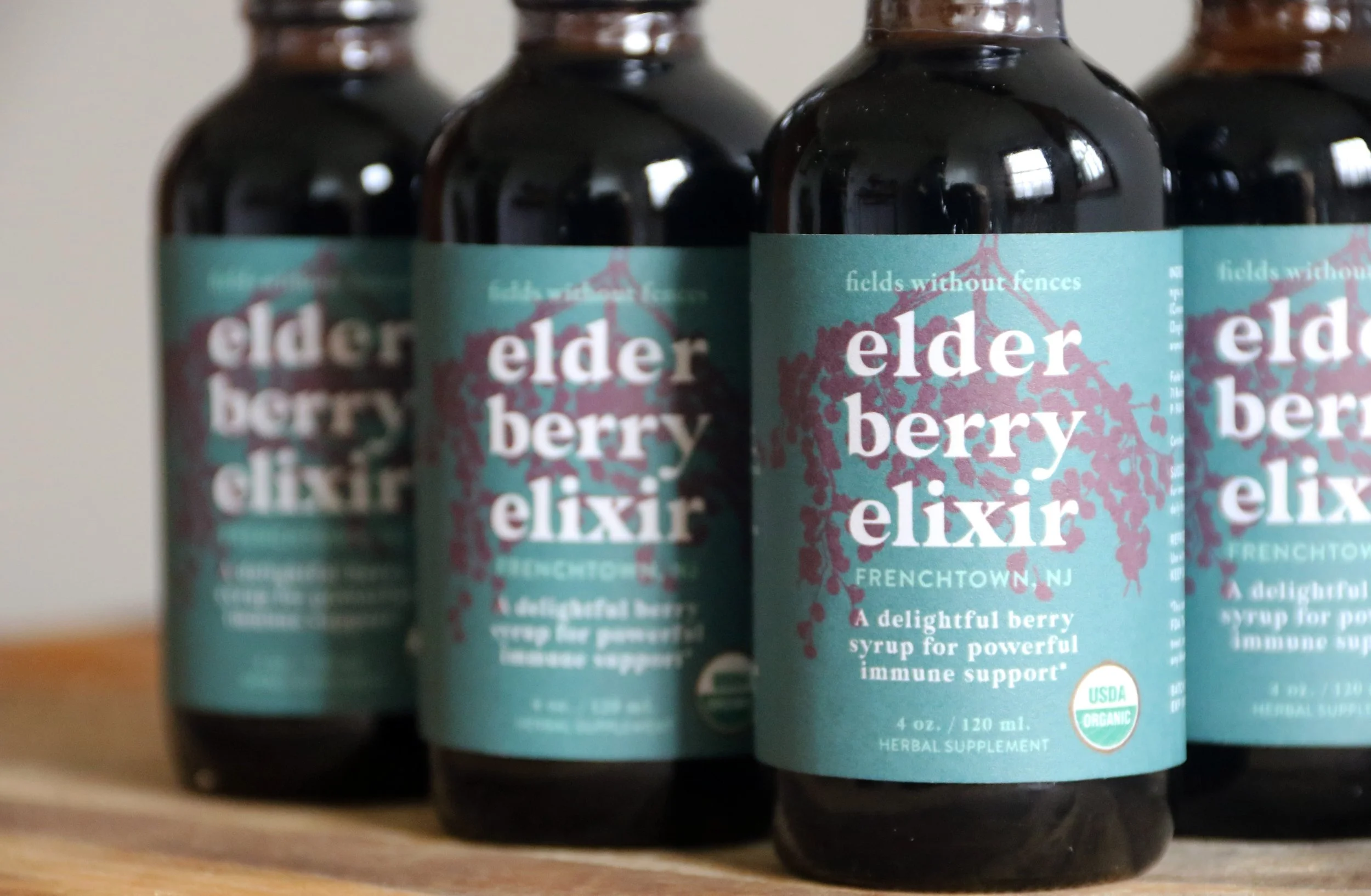 ElderberryElixir-4oz-set-closeup-2F5A4263 copy.jpg