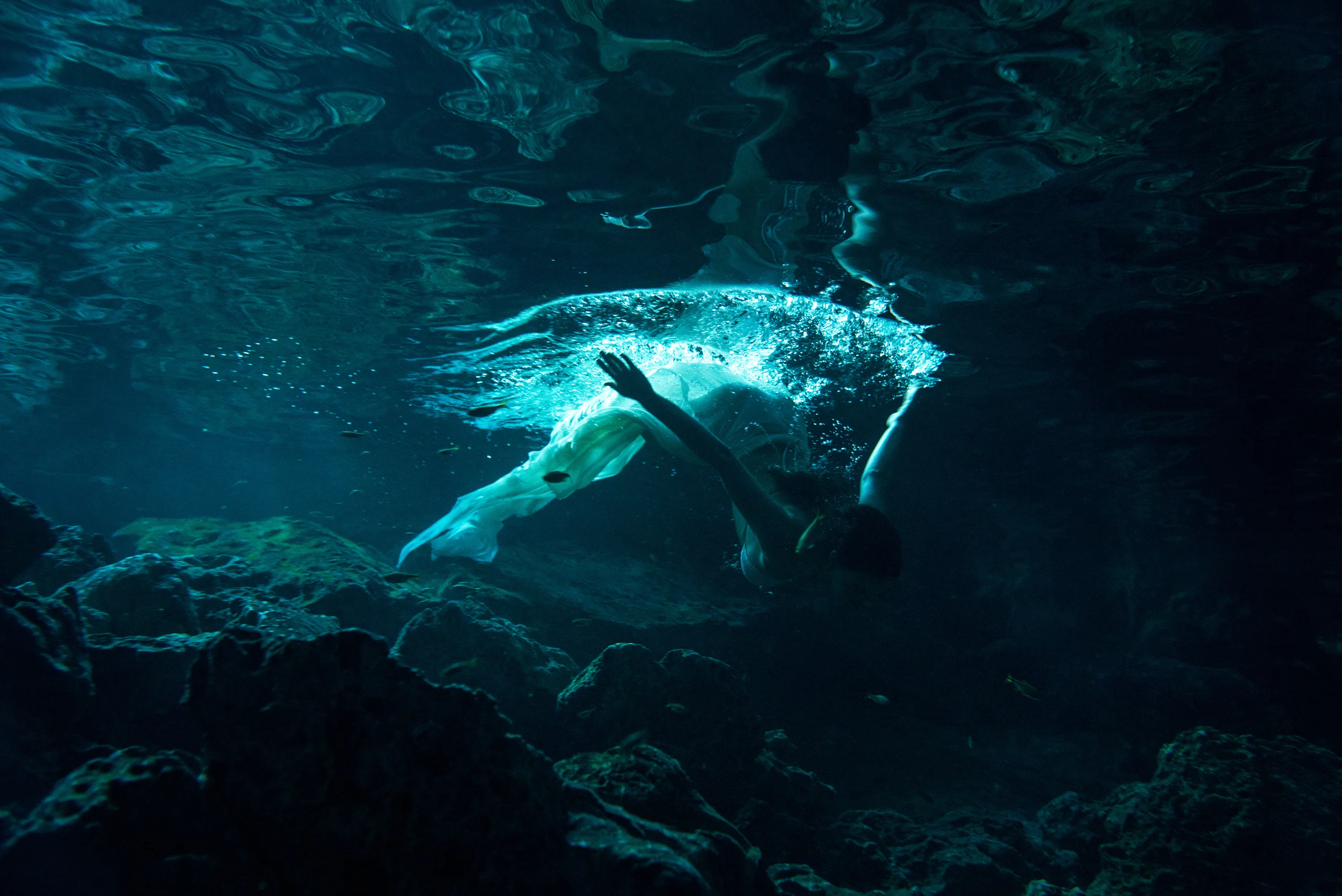 Kristina Nikitina underwater at Dos Ojos cenote, Mexico / See more...