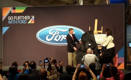 Mulally unveiling restored painting.jpg