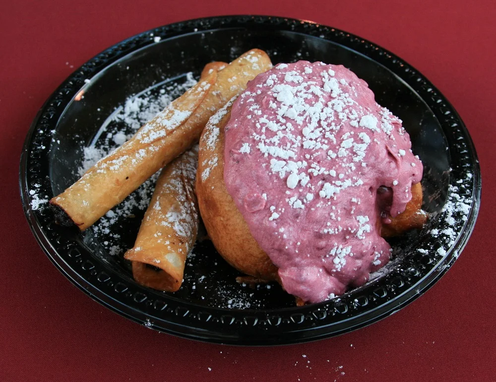 My favorites: Flautas and Fun Bun! The Boysenberry Flauta is Boysenberry preserves rolled in a flour tortilla and lightly fried. The Fun Bun (boysenberry ring layers in a warm bun, smothered in an ooey gooey Boysenberry topping, and then sprinkled with powdered sugar. The fun bun is deceptively huge. You'll want to share it with one or two other people.