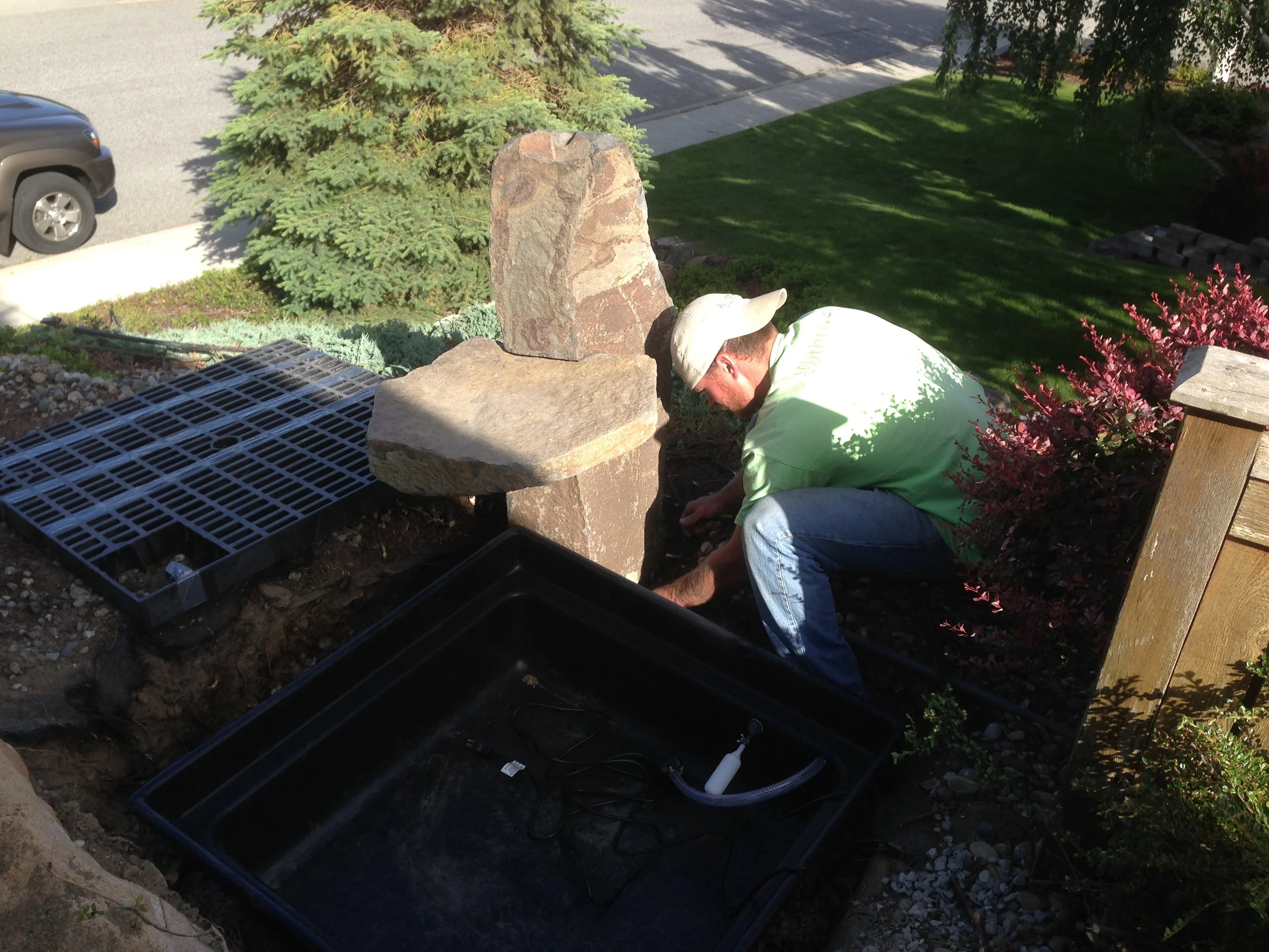 Hooking up the pump to the rock.