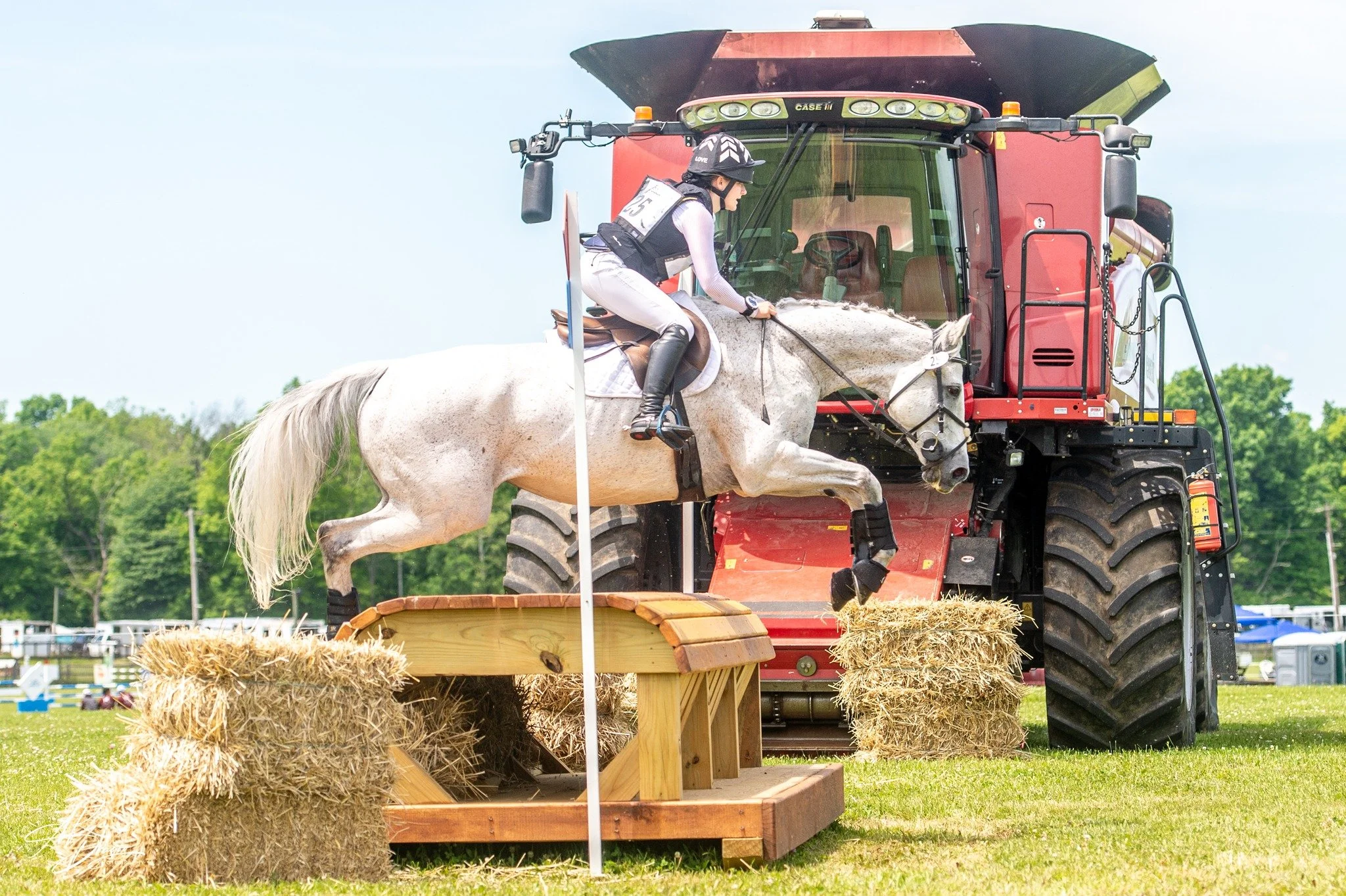 Years ago I saw a photo from the UK of a combine harvester incorporated into a jump. While this one isn't the actual fence, I've looked forward to the day I could include a one into an image. 📸 @leahservin/@dragoophoto

@essexhorsetrials #goals