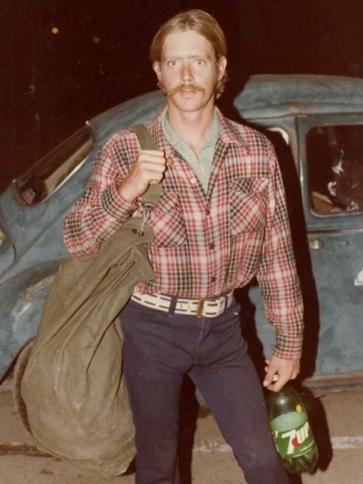 Starting around 1973, Doug Biggert began commuting in his green VW Bug to and from San Francisco and later Sacramento, picking up hitchhikers for company along the way, and taking informal portraits of his passengers. Biggert continued this practice 