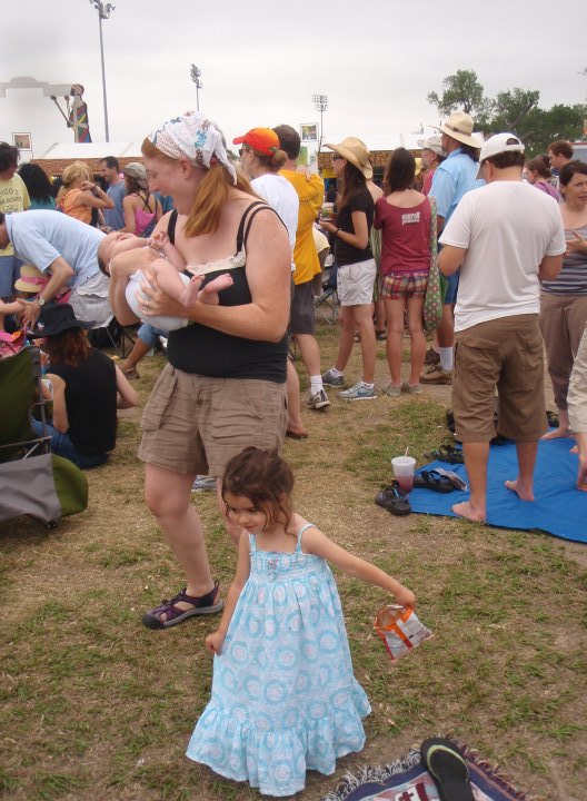 Just two months after baby number two. &nbsp;My body is dancing at Jazz Fest, keeping up with my toddler and nourishing my baby. My hair was shedding so I didn't wear it down freely to keep myself from being covered in hair.