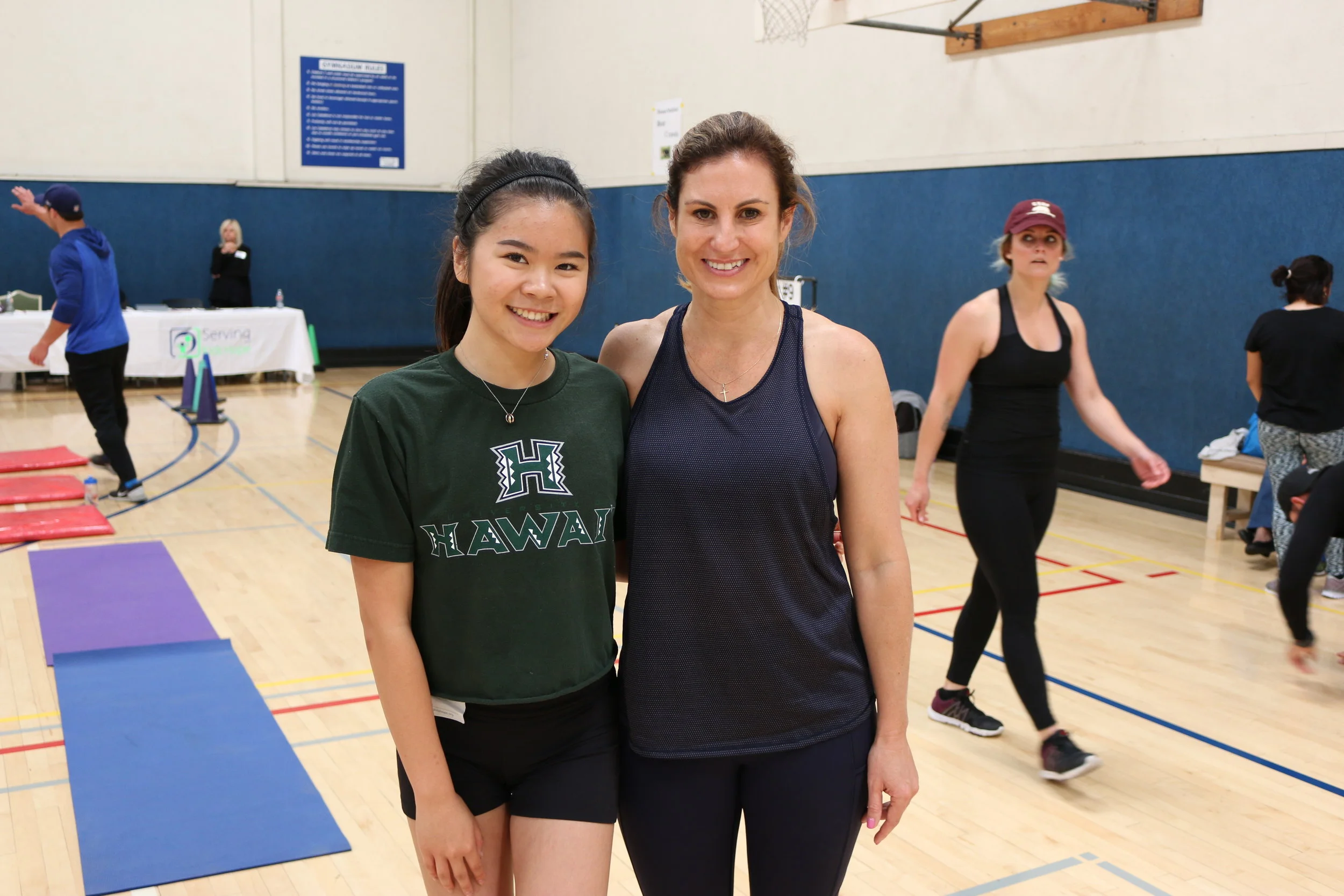 Sarah Harwell (left) with Dr. Riba (right), founder of Serving Kids Hope, at the second annual Fitness Decathlon, a yearly fundraiser for Serving Kids Hope.