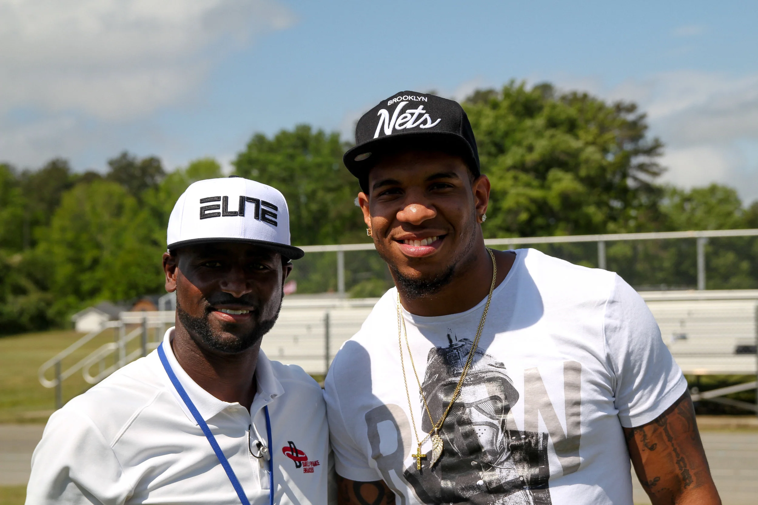 Coach Daniels (Left) with Guest Speaker for The Nate Daniels Football Skill Camp NFL TE Eric Ebron (Right) of the Detroit Lions. Ebron was an All American at The University of North Carolina at Chapel Hill. and A First Round, 10th Overall Pick in the 2014 NFL Draft.
