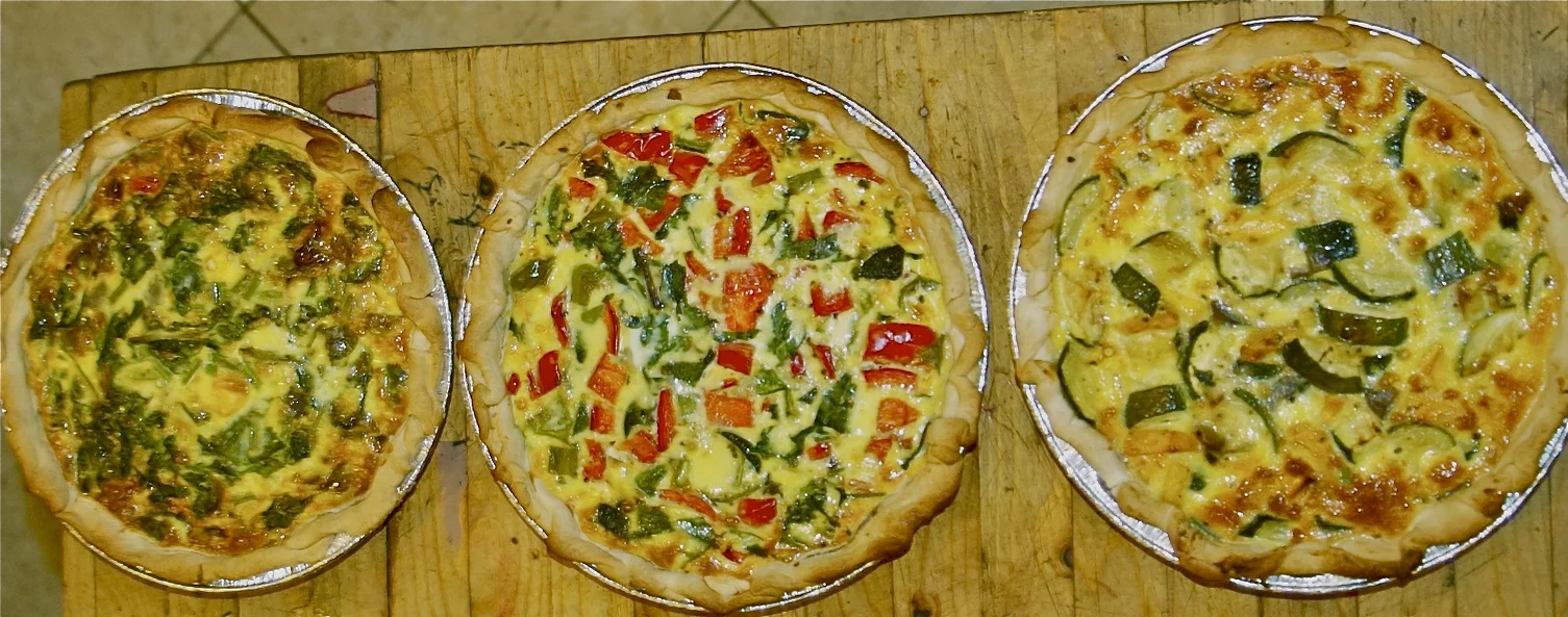 {Caramelized Onion, Cheddar, Purple Potato and Chive Quiche} + {Zucchini, Buttercup Squash, Green Bean & Goat Cheese Quiche}+{Tomato, Bell Pepper, Greens and Mozzarella Quiche}