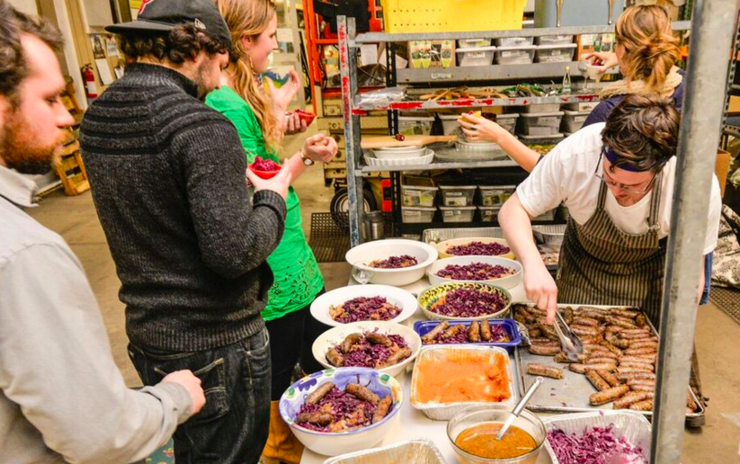 Kitchen Team Plating Entree// Photo by James Bassett-Cann