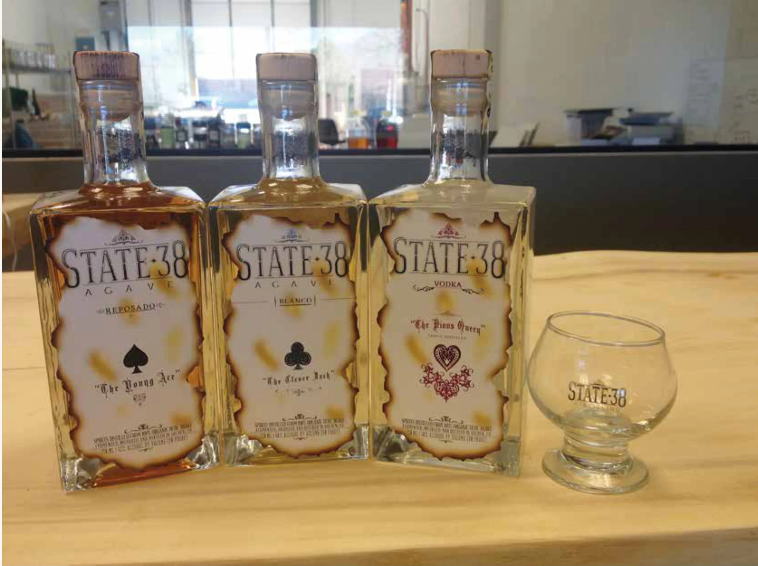 The Young Ace, reposado agave spirit, The Clever Jack blanco agave spirit and The Pious Queen vodka are part of the agave-centric spirits line distilled at State 38. The distillery also makes an agave-based gin. Photo courtesy of State 38 Distilling