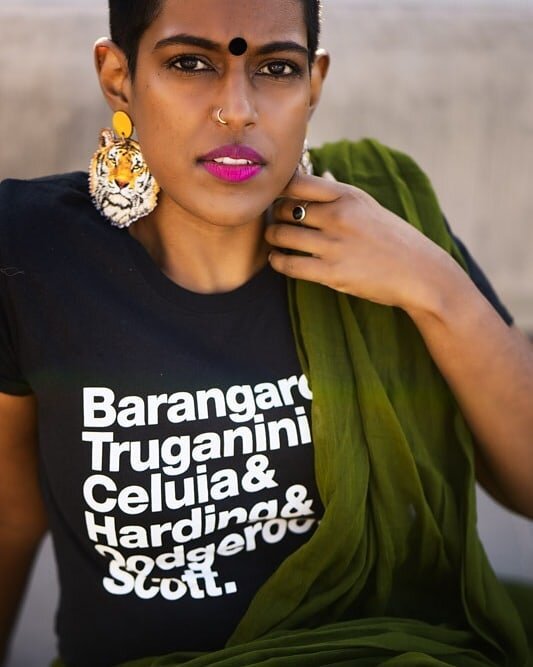 If you are not yet following தமிழ் writer and poet @thelongstoryshortis - you should!! 🐅🔥👑 Her tshirt created by @ascensionmag lists the names of Aboriginal warriors - Barangaroo, Truganini, Celuia, Harding, Oodgeroo &amp; Scott ✊🏿. https://ascen