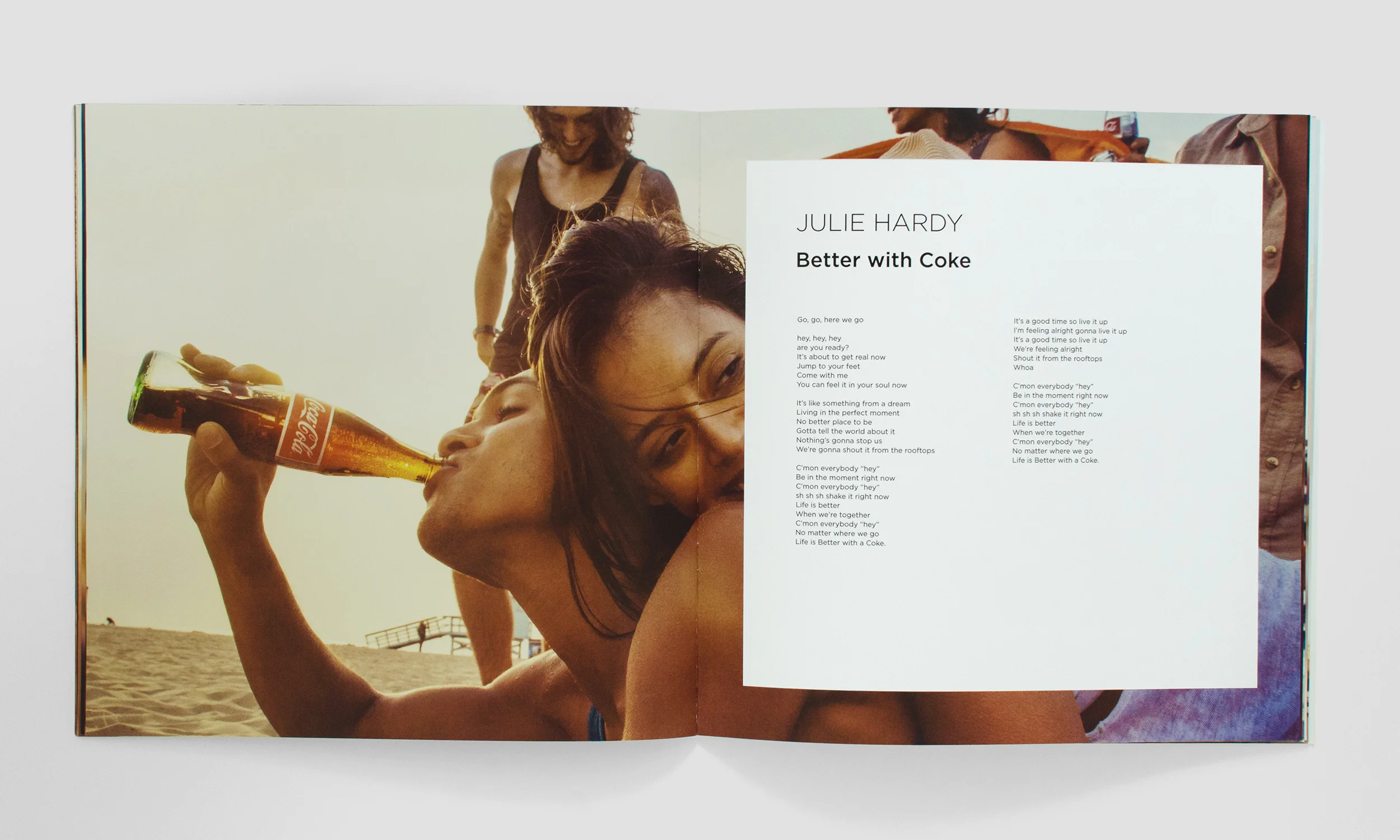 Booklet spread with song lyrics