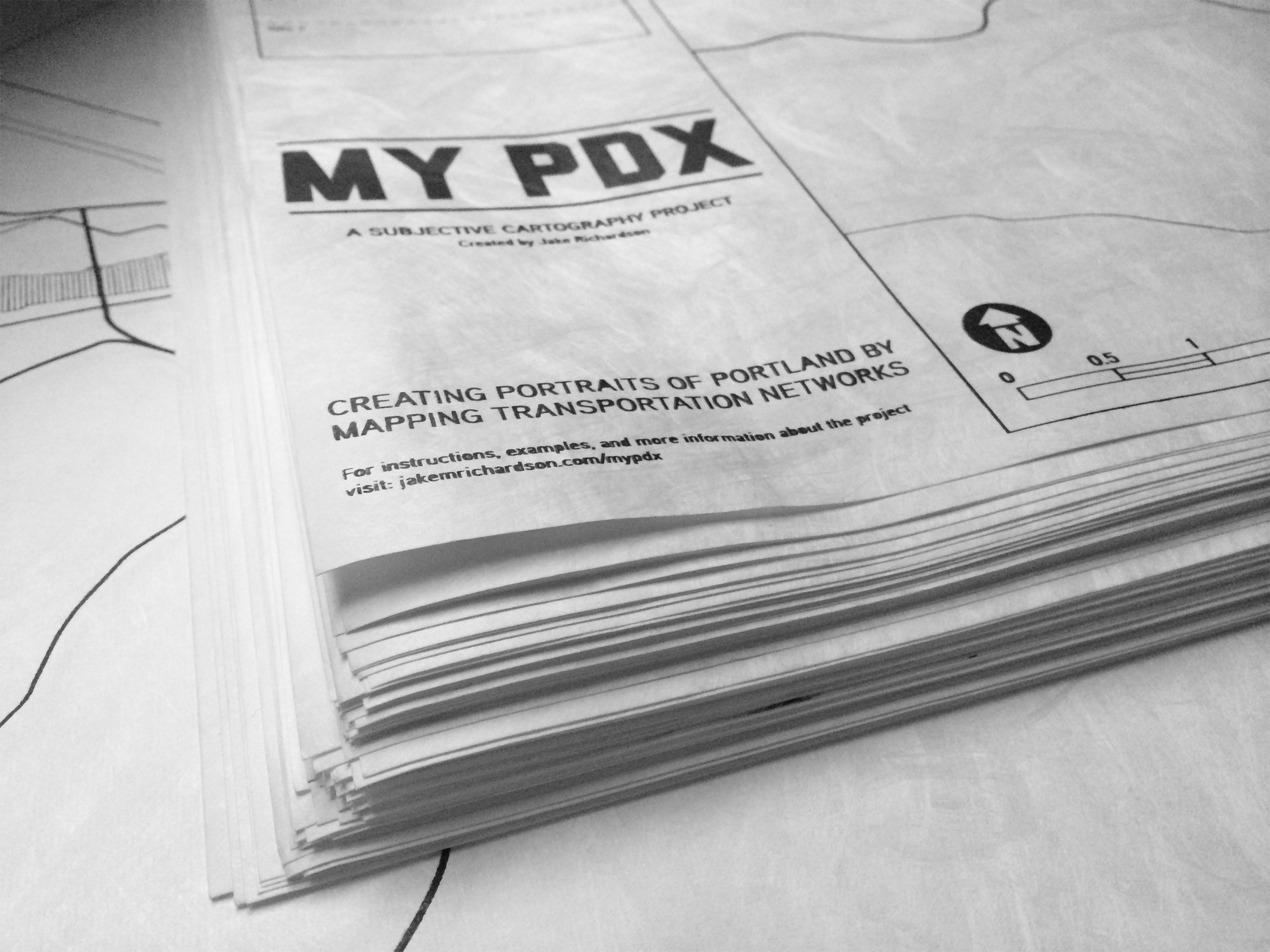 Stack of fresh maps ready to be folded
