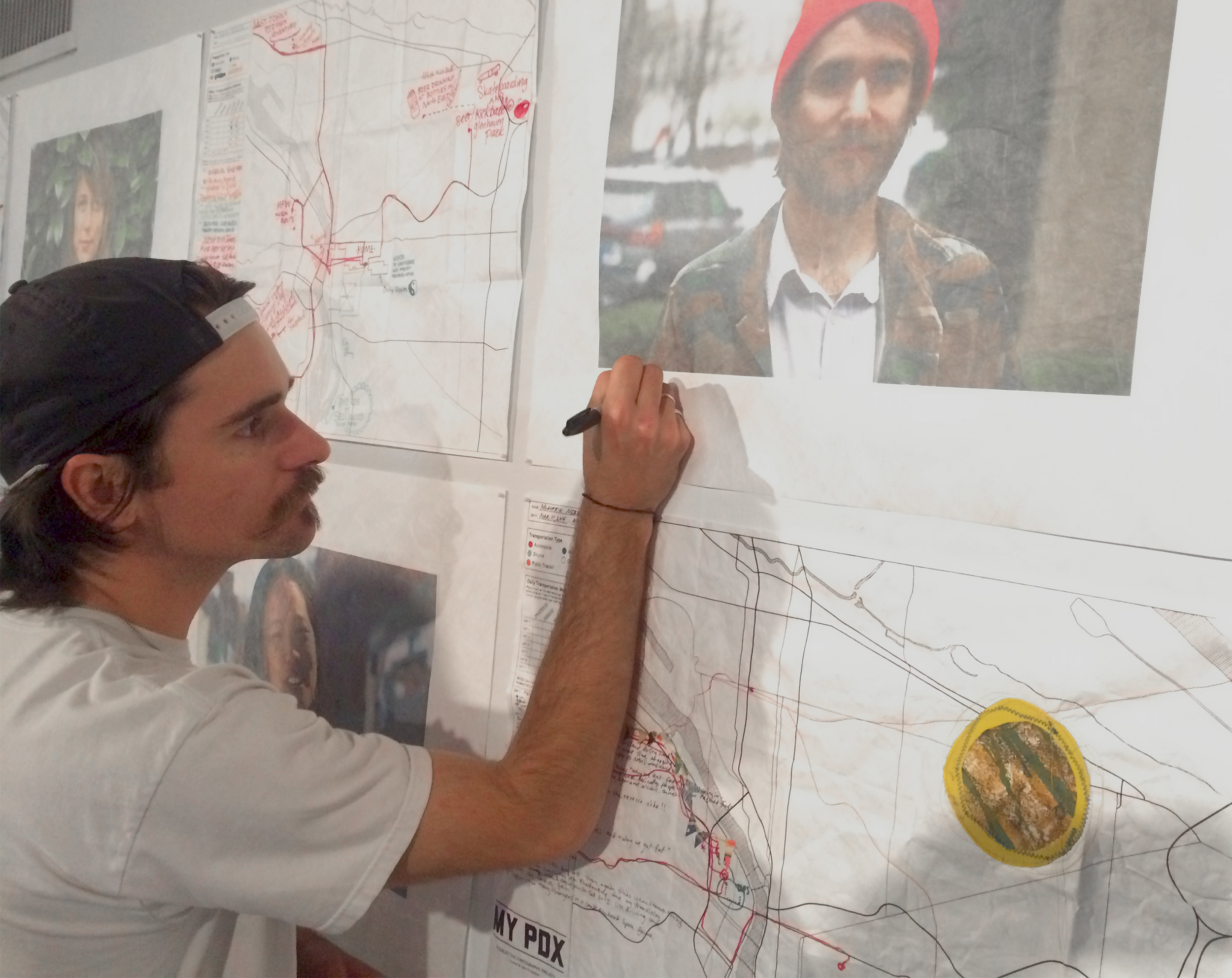 Kevin signing his photo at the opening
