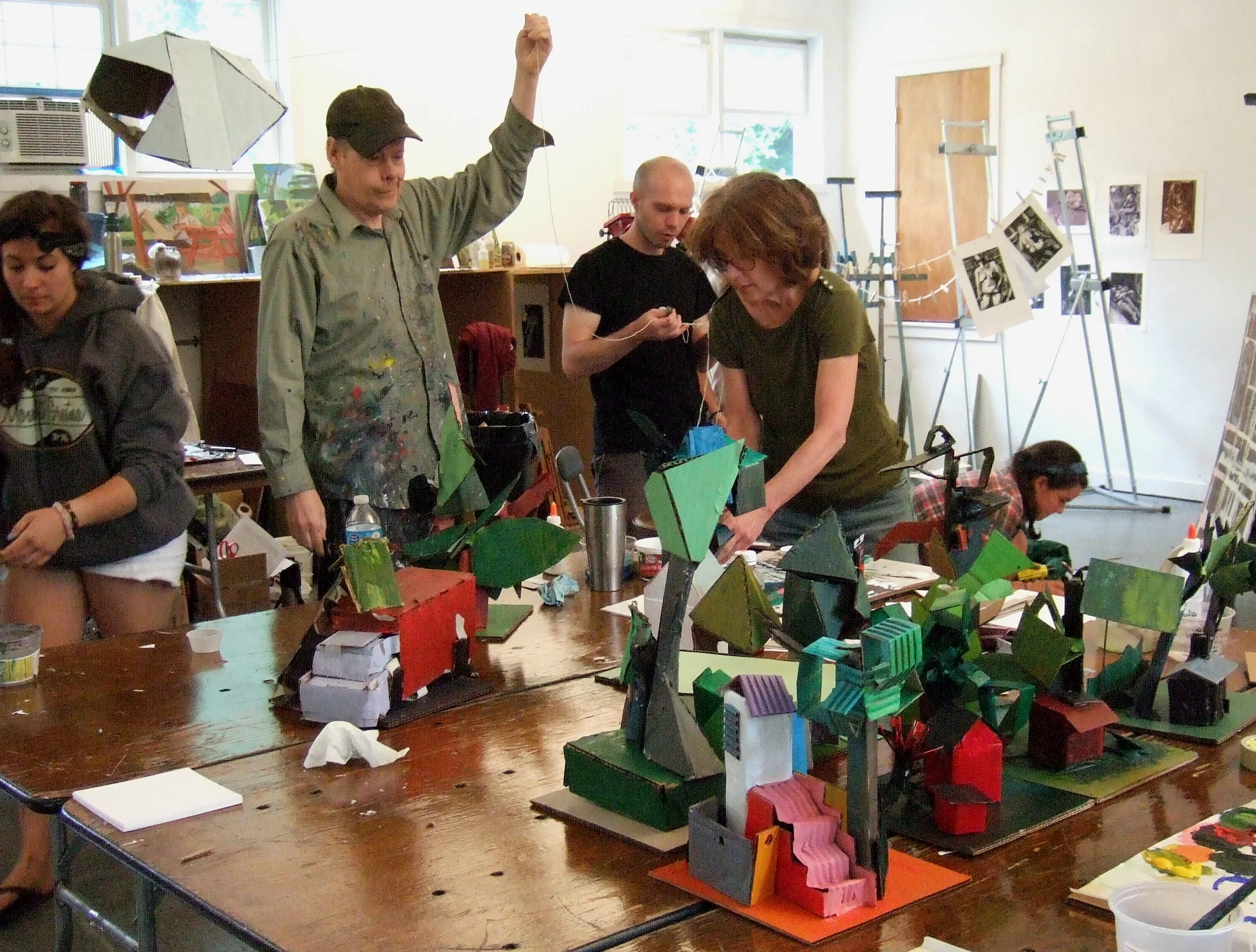 Ken Kewley stringing up a cardboard cloud