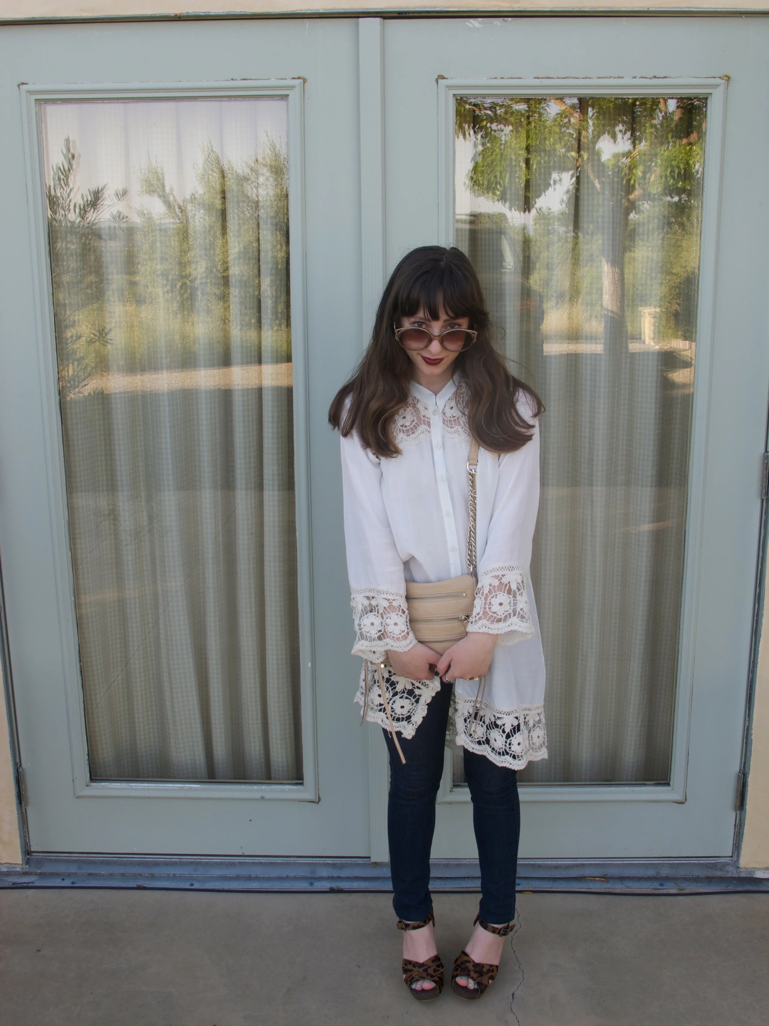 Silk & Crochet Tunic: Free People, Dark Skinny Denim: James Jeans, Leopard Wedges: Sam Edelman, 5-Zip Mini Purse: Rebecca Minkoff