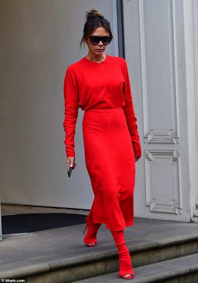 18142498-7434539-Lady_in_red_Victoria_Beckham_made_a_very_bold_style_statement_on-m-11_1567756394828.jpg