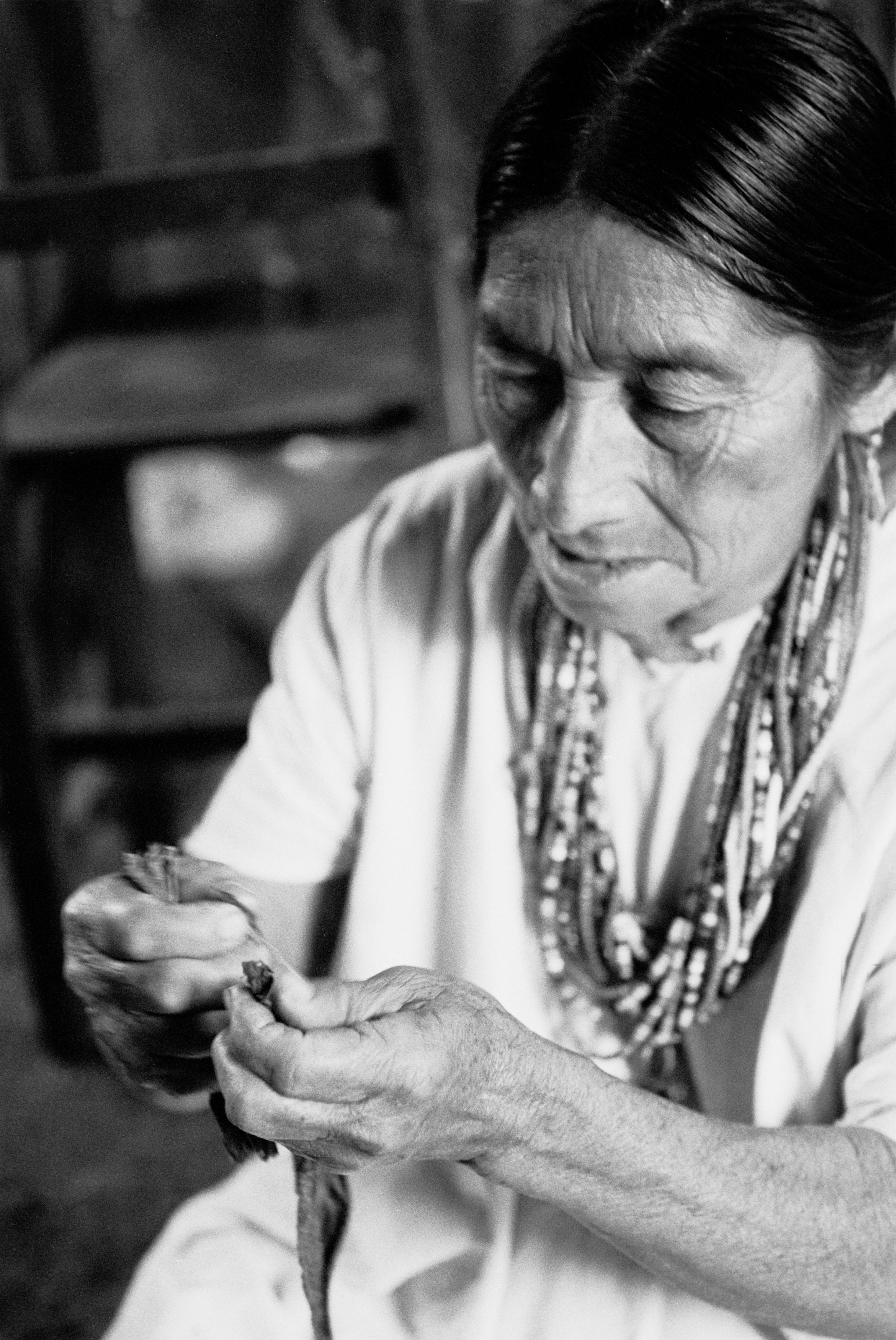  Koh-Maria, the first wife of Chankin Viejo, rolling cigars. Since his death she has kept the rolling of cigars tradition alive and passed it on to her children.  The cigars will be used in religious ceremonies and smoked for recreation.   