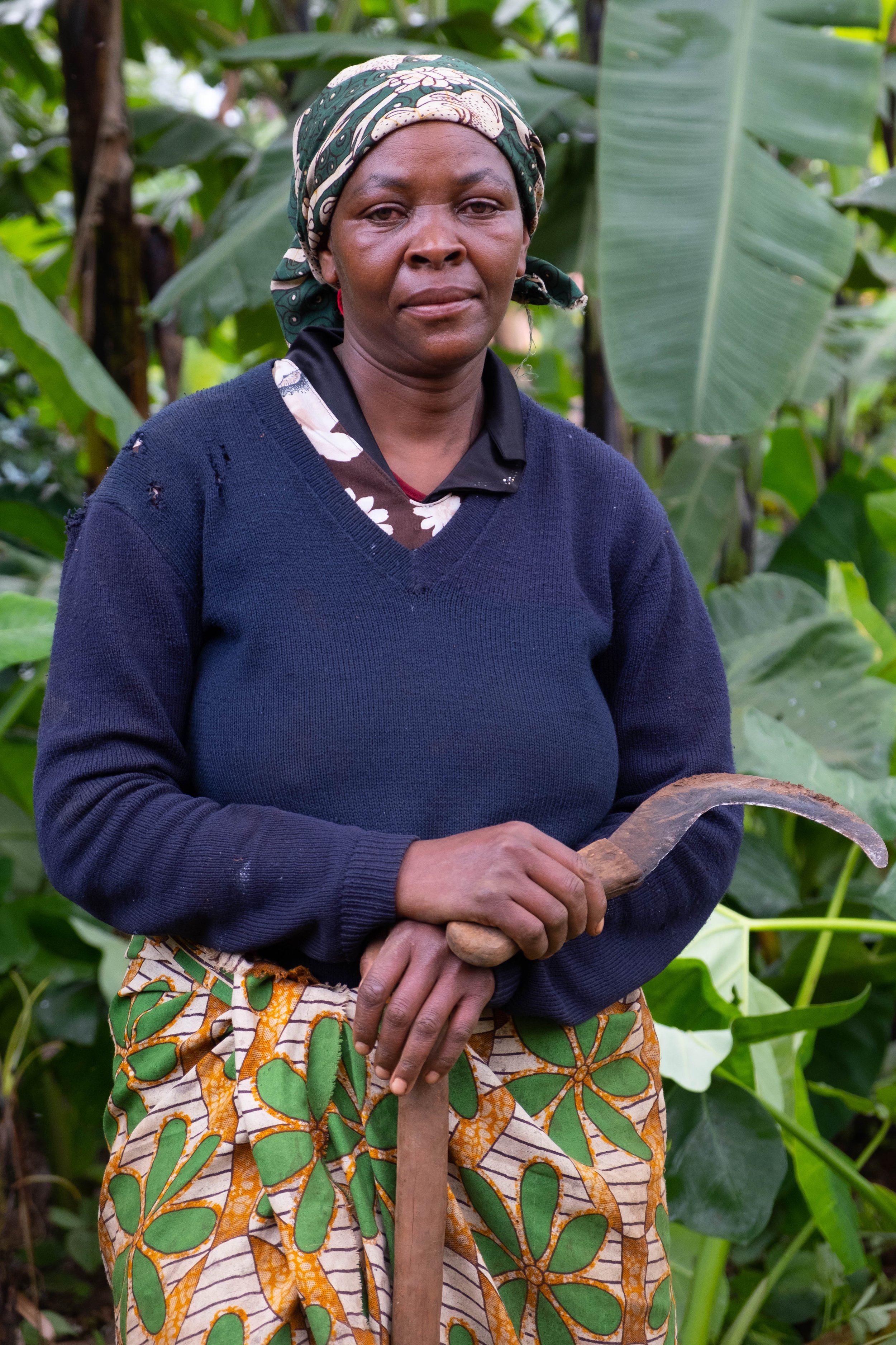  Felista Petron Mtalo, age 51, she has been working in coffee production for 26 years.  Materuni Village, Tanzania.  June, 2023. 