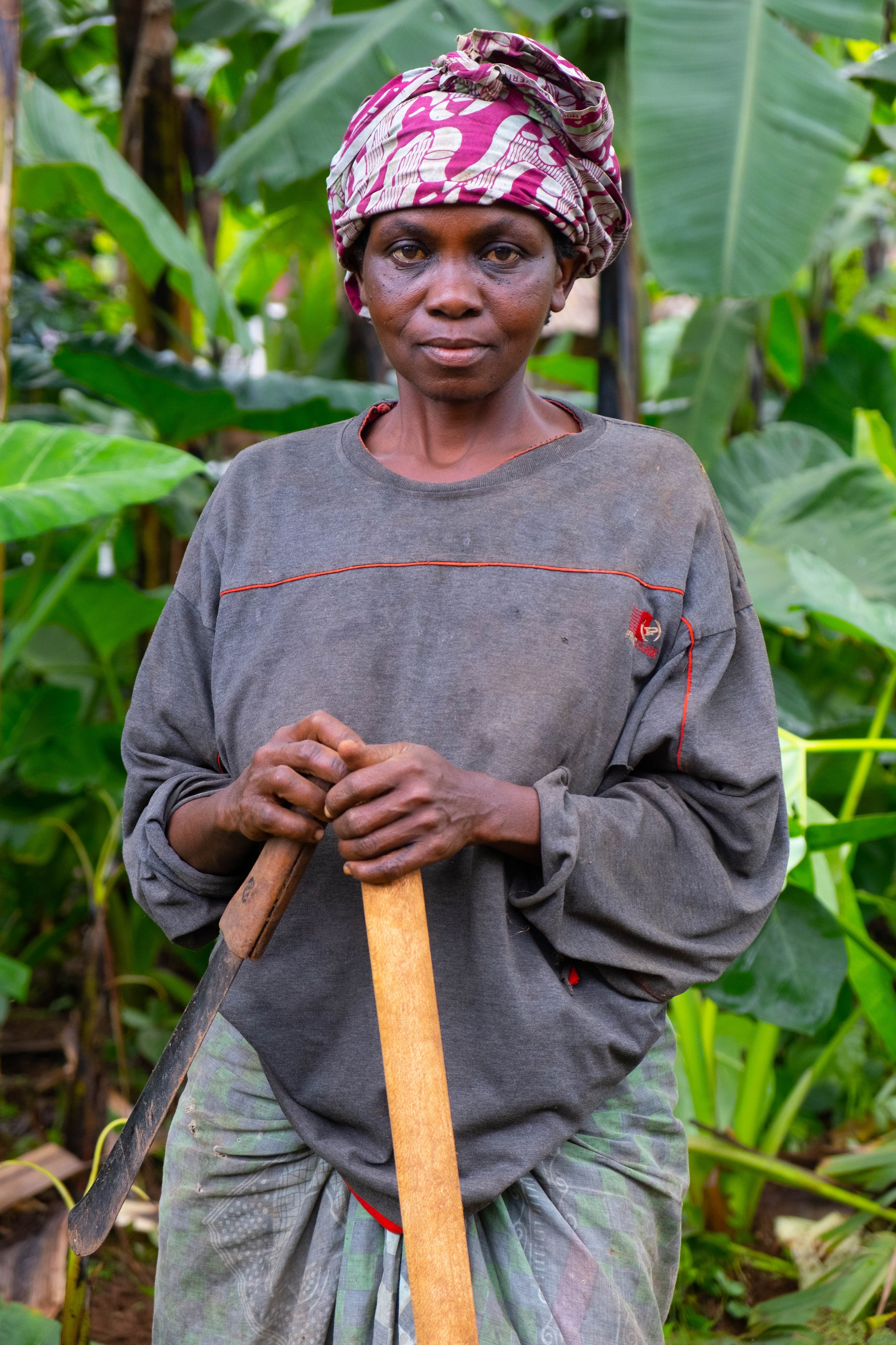  Matrona Barnaba Materu, age 50, she has been working in coffee production for 20 years.  Materuni Village, Tanzania.  June, 2023. 