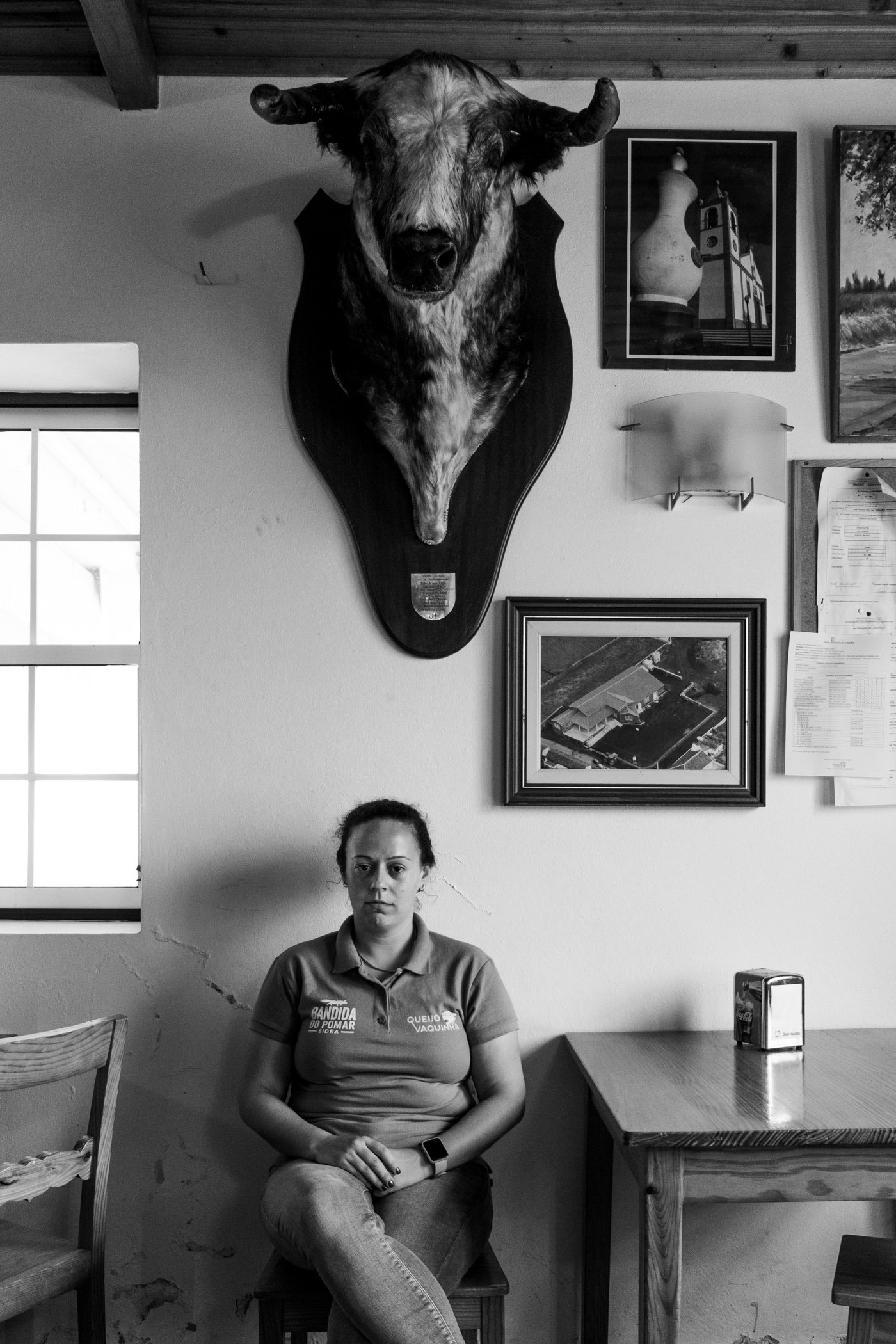  Zita Cota, with a prize bull from a Holy Spirit Festival. She is a 5th generation cheese maker, Queijo Vaquinha, Terceira, Portugal. The bull, Number 38, “Gatuno”, was born in 1997, participated in 71 Holy Spirit runs until he was enshrined in this 