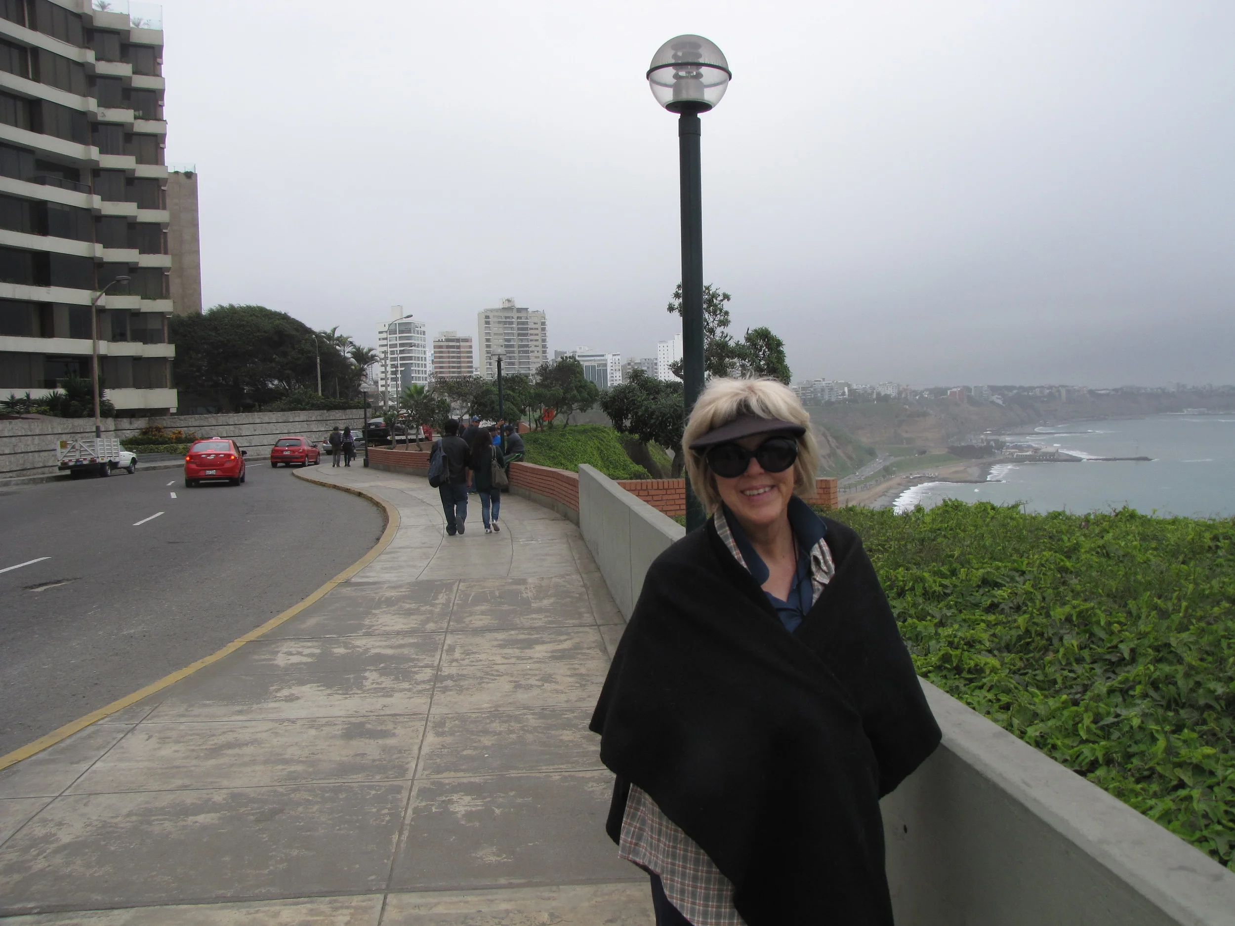 Ann with Pacific Ocean in back - chilly