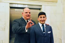 Mr. Biggley and J. Pierpont Finch