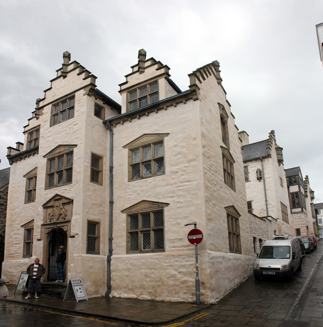 Exterior Plas Mawr - looking head-on at the gate house. The house runs up the street. Note the Flemish influence on the architecture. Gwinn was impressed by them in his travels.