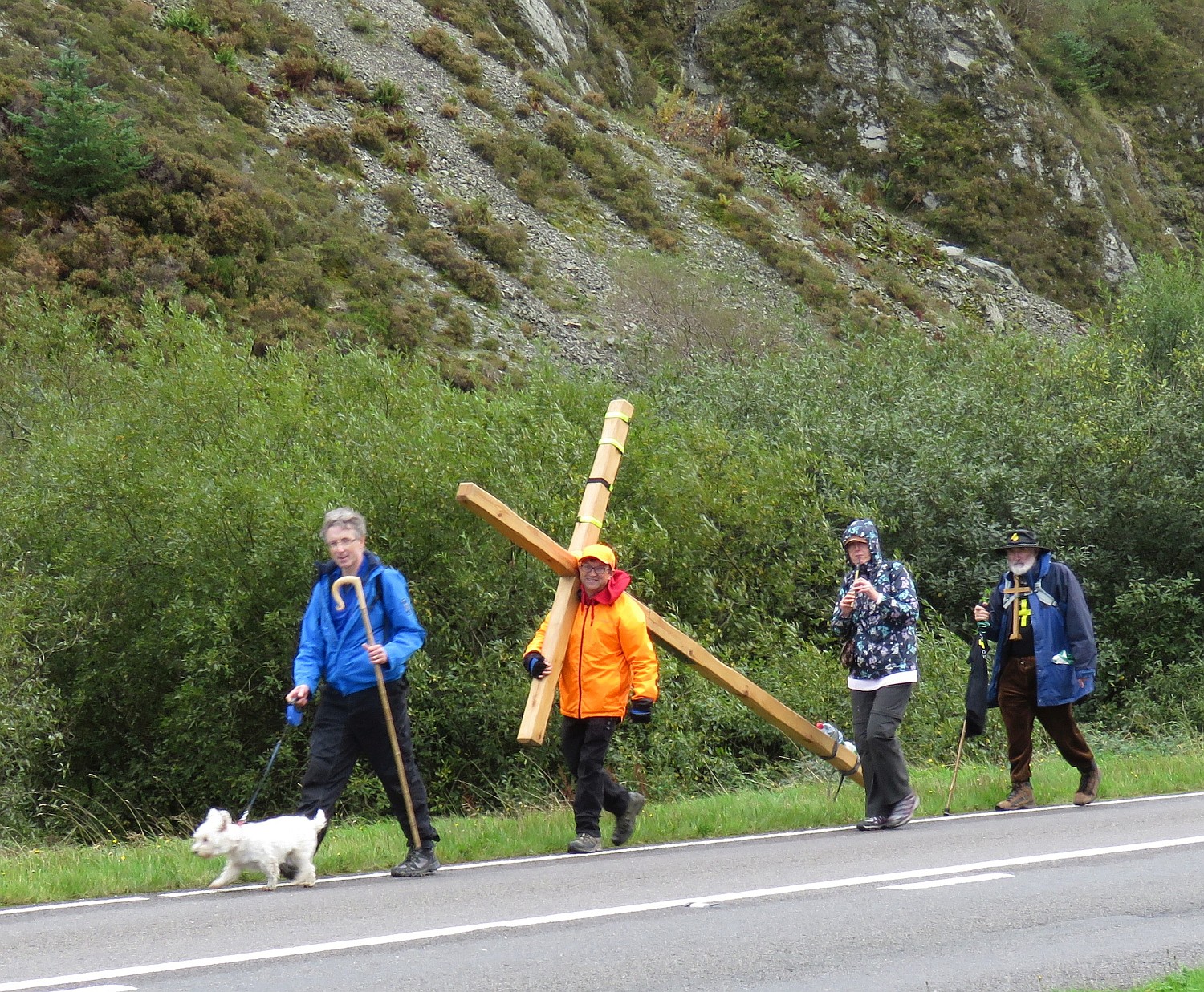 Man walking across Wales with the Cross