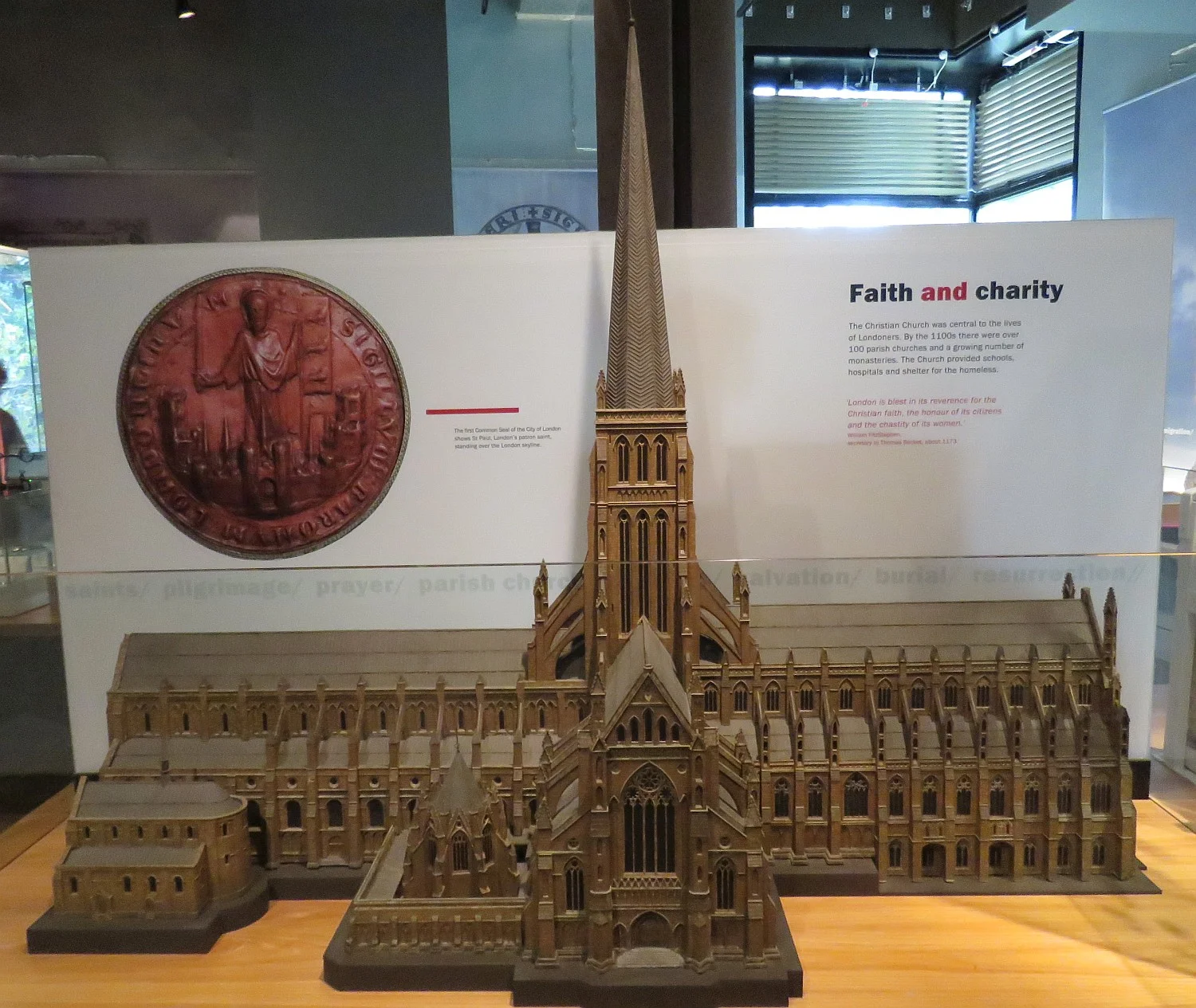 Model of the St. Paul's Cathedral prior to the fire. Note the early Romanesque small original churches on the left. The new cathedral, which will you see in future photos, was designed by Christopher Wren and is huge and austere, not Gothic.