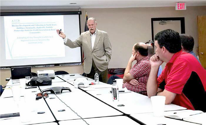 Wes Jurey, President & CEO of the Agricultural Technology Innovation Partnership Foundation (ATIP), leads a discussion at the Mineral Wells Area Chamber of Commerce on this regional biochar project, funded in part by USDA Rural Development (HQ, Washington, D.C.). The project includes 14 counties of north Texas and several corporations, and is managed by the TX Biochar Initiative Steering Committee. Photo credit: David May, Mineral Wells Index, used with permission.