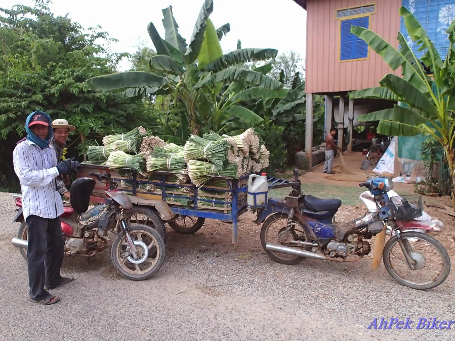 A Cambodian man (not Sorn) transporting produce to market