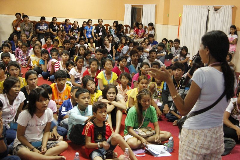 Serey training Alongsiders and their little brothers and sisters at an Alongsiders camp