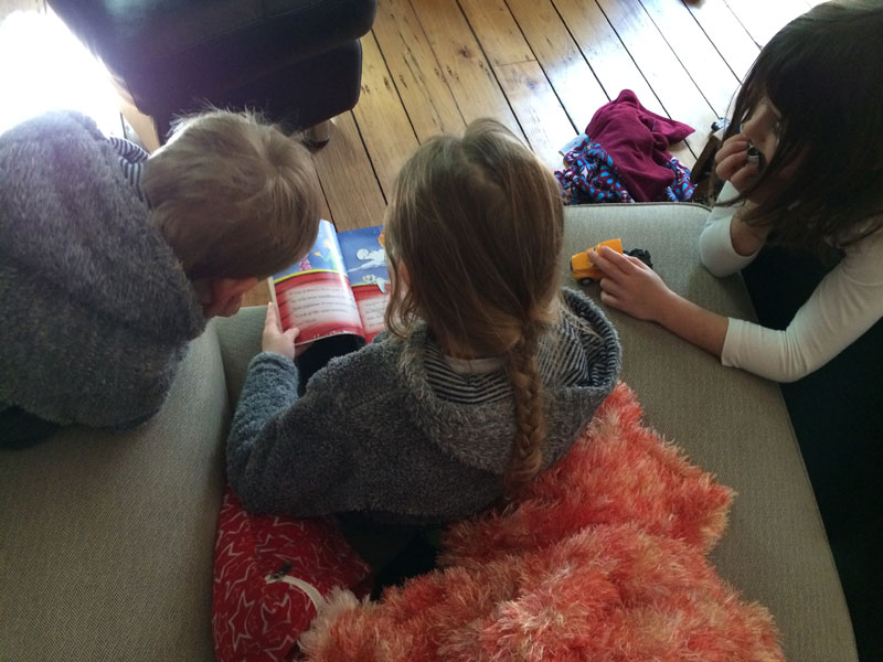 Zoe reading to her siblings. Something that I want to happen every day!