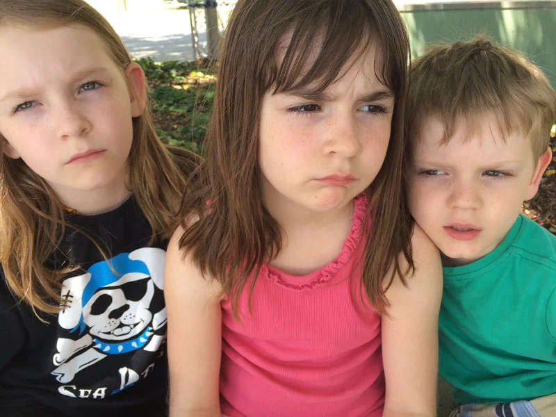 Three exhausted and very cranky monkeys after three hours at the museum - this was not put on! This is what they actually looked like and I had to be quick getting the photo because they were bickering so loudly!