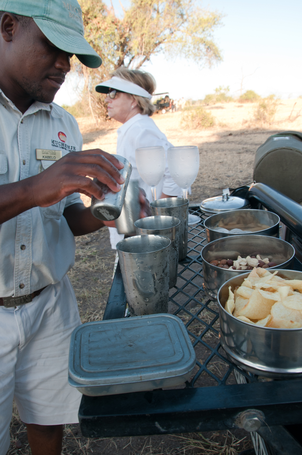 Kabelo preparing our G&Ts